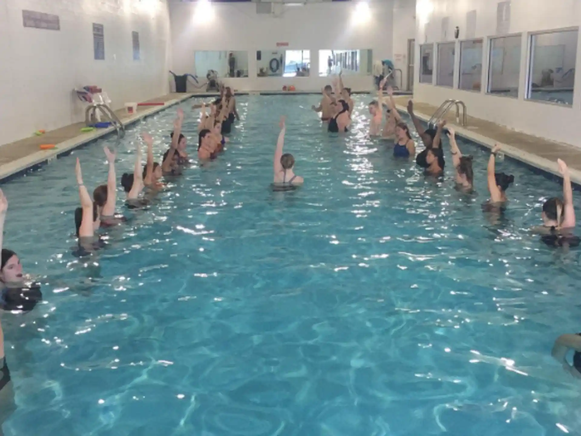 a group of people in a pool