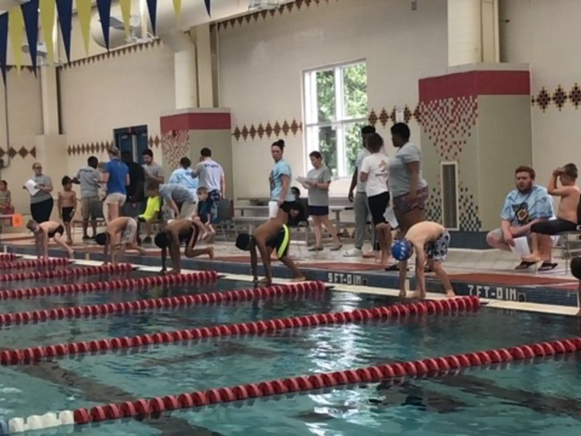 a group of people in a swimming pool