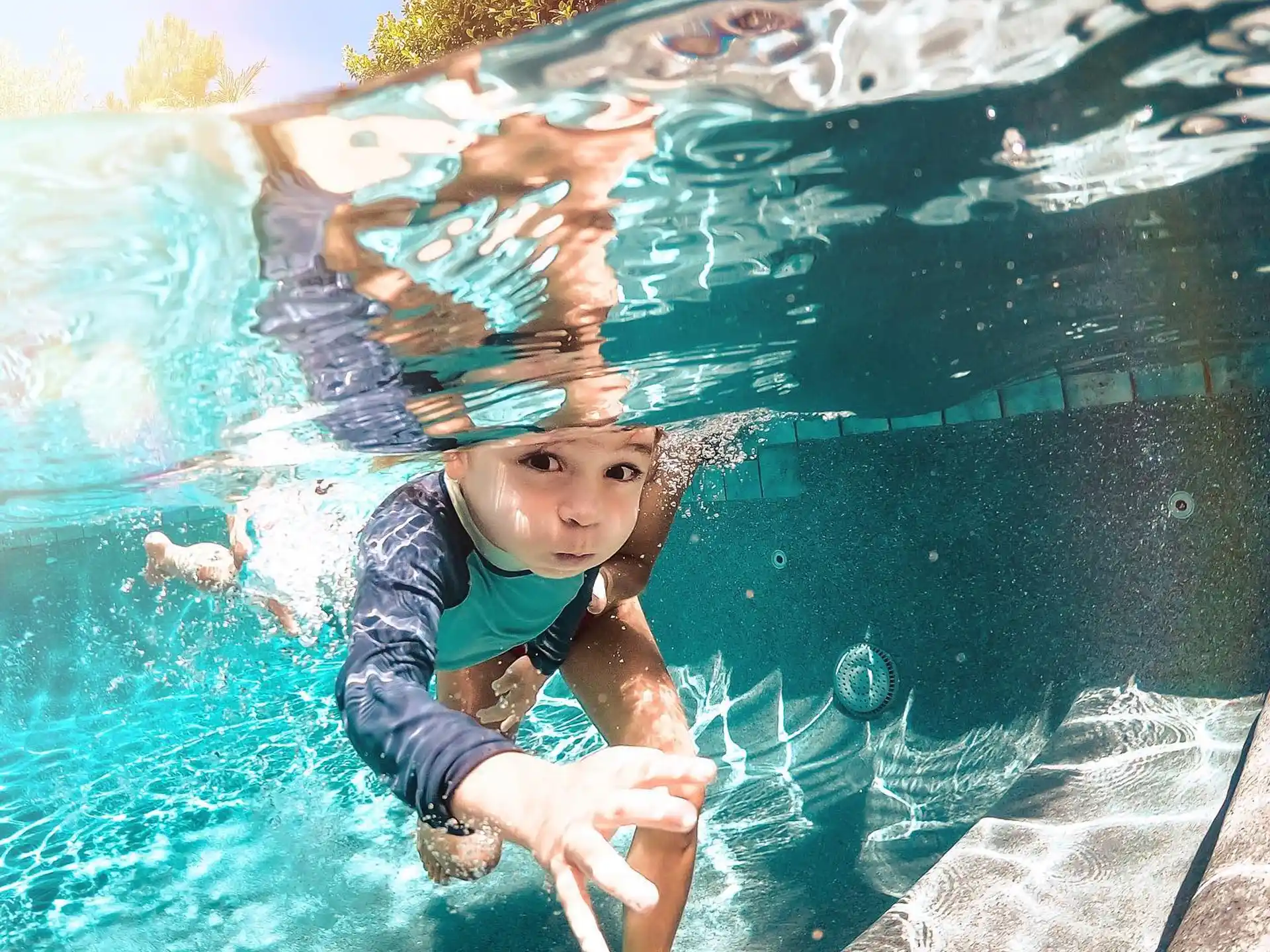 a boy in a pool
