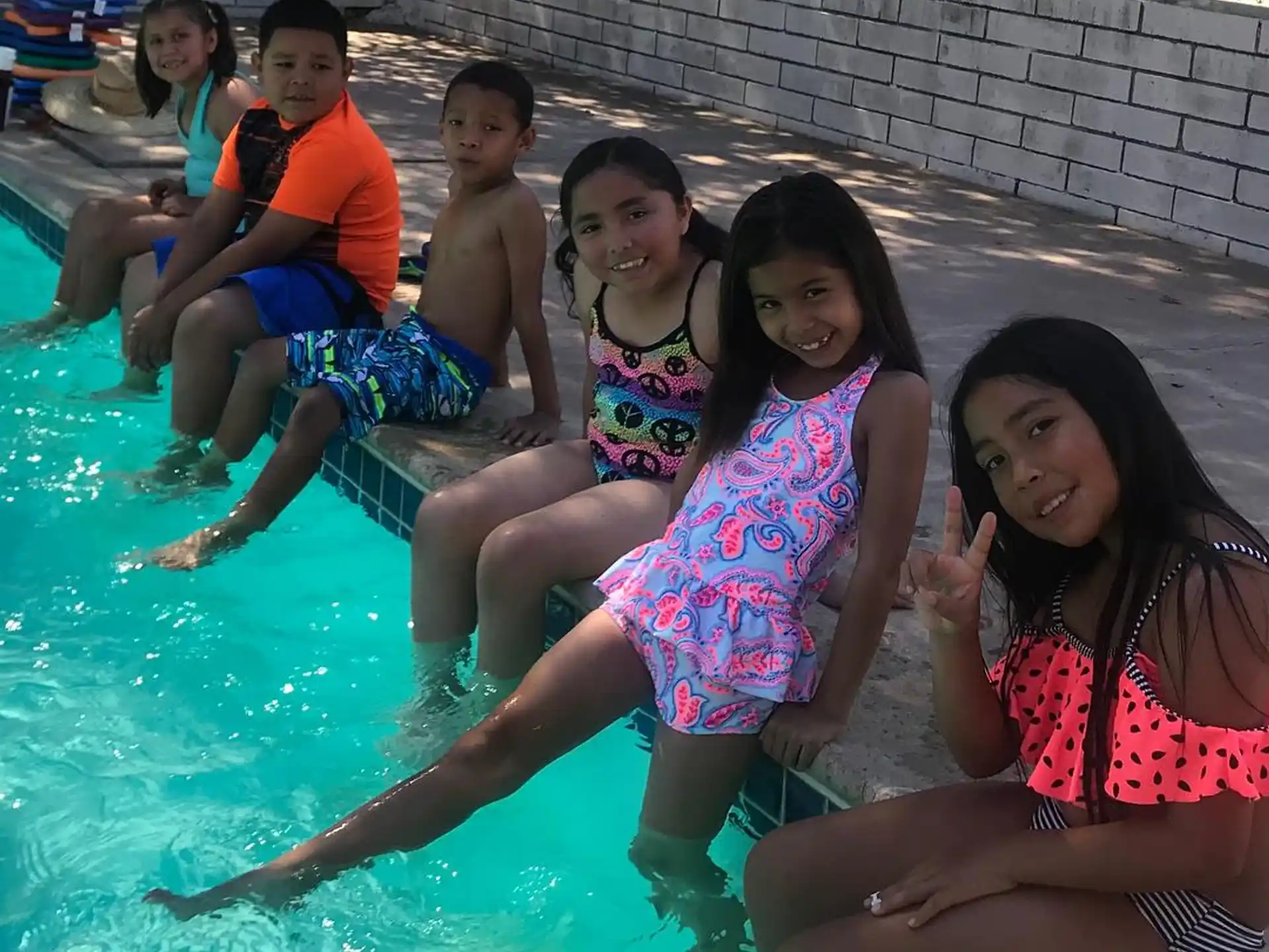 a group of people in a pool