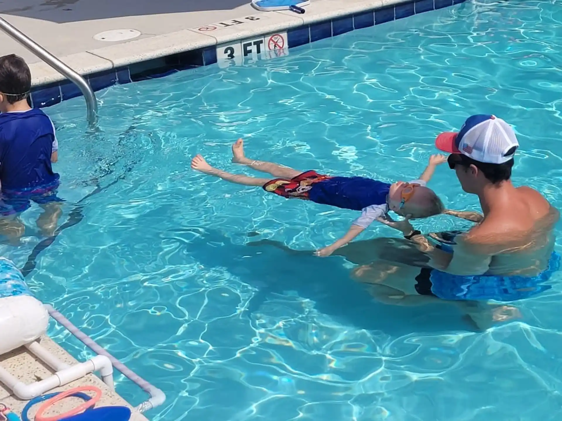 a group of people in a pool