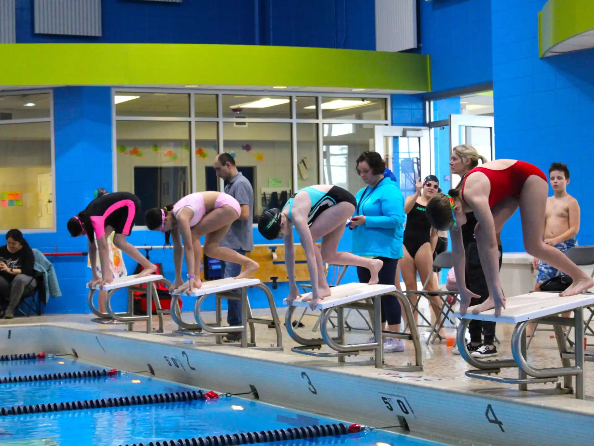 a group of people in a swimming pool