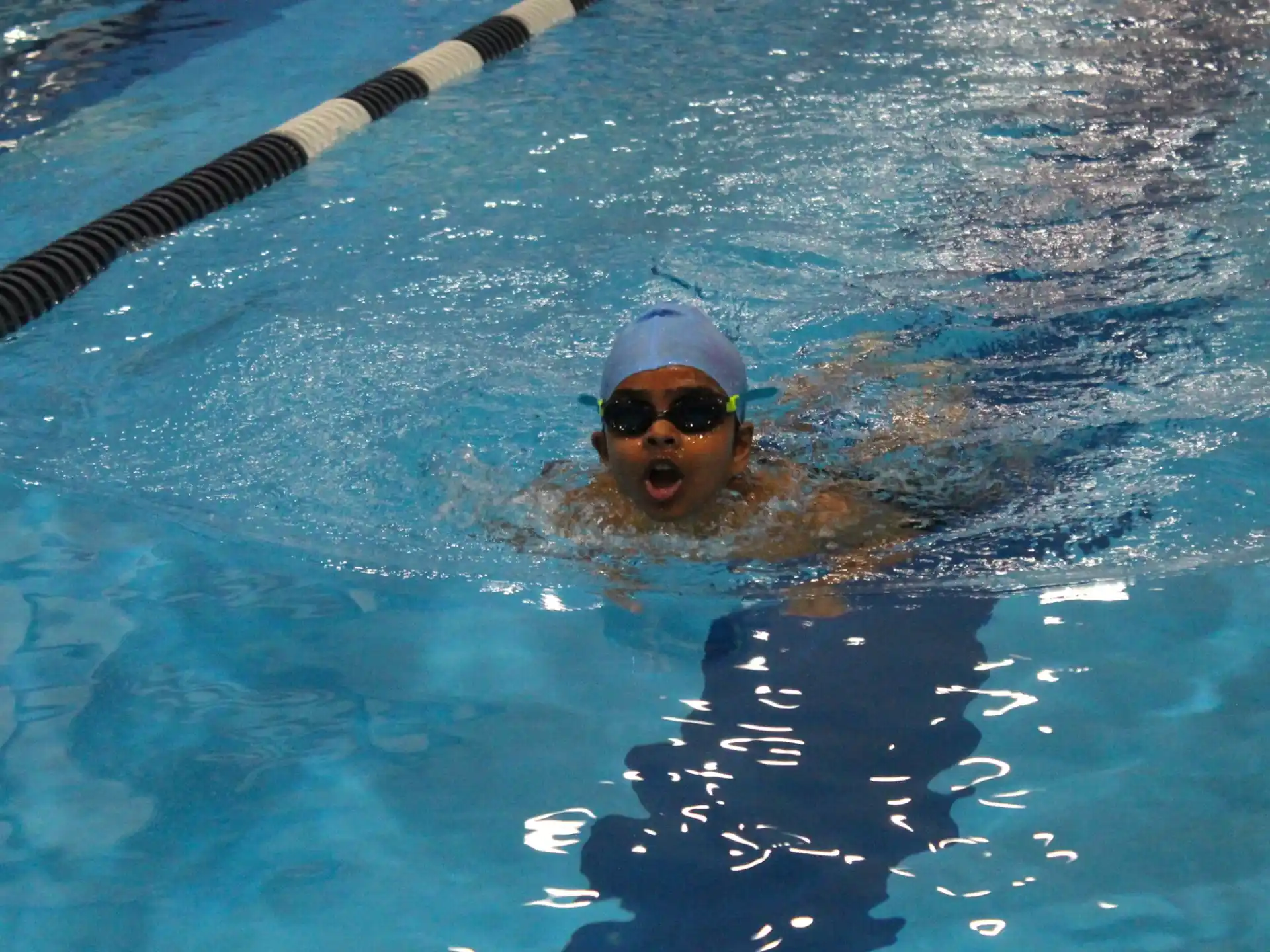 a person swimming in a pool