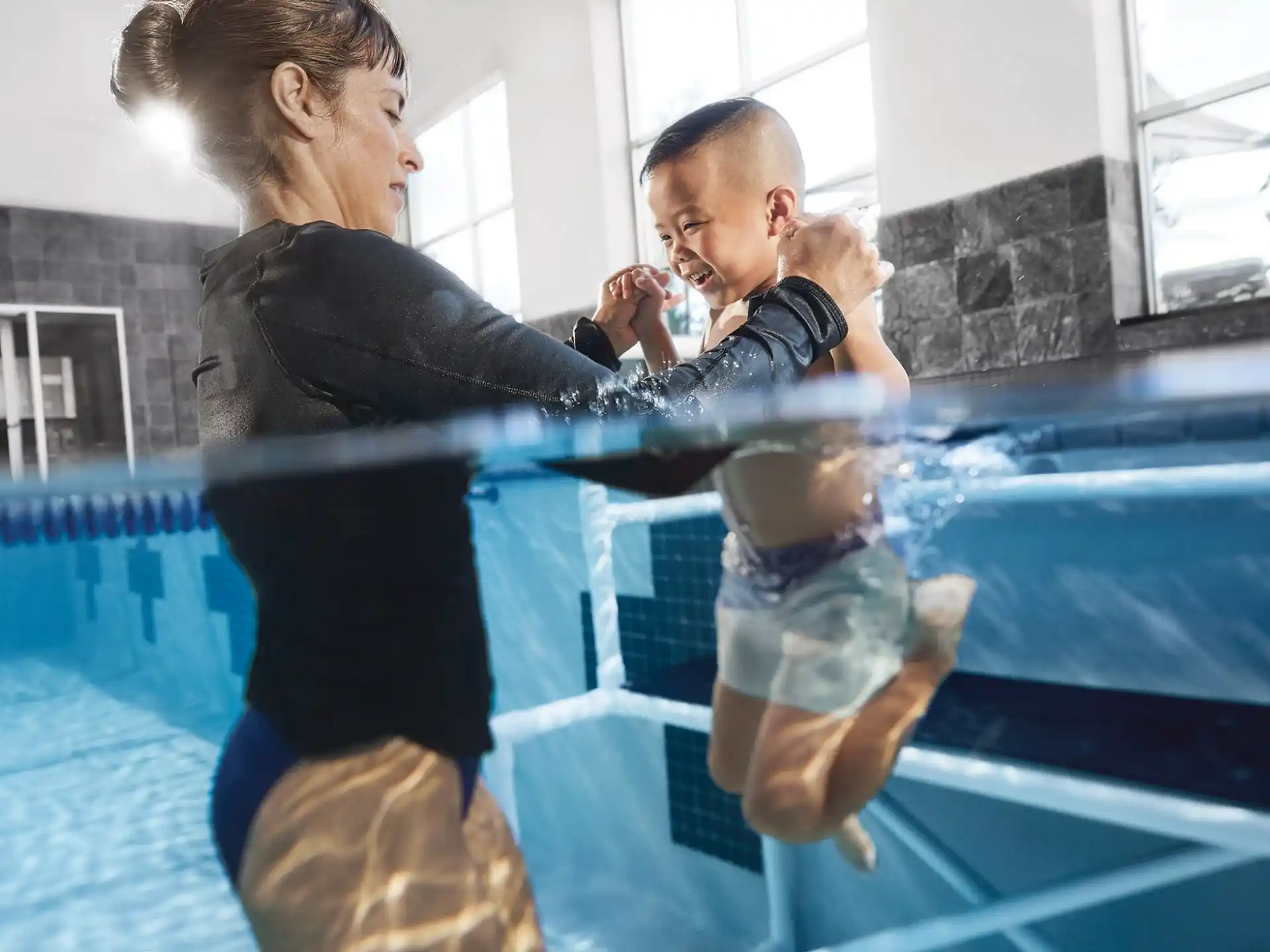 a man and a woman in a swimming pool
