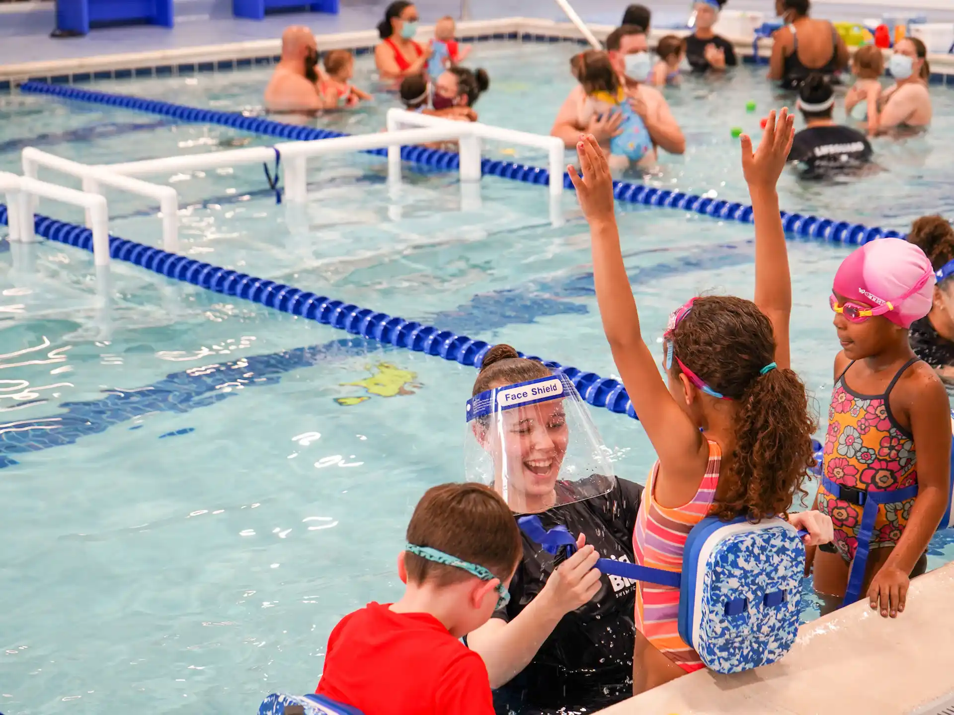 a group of people in a pool