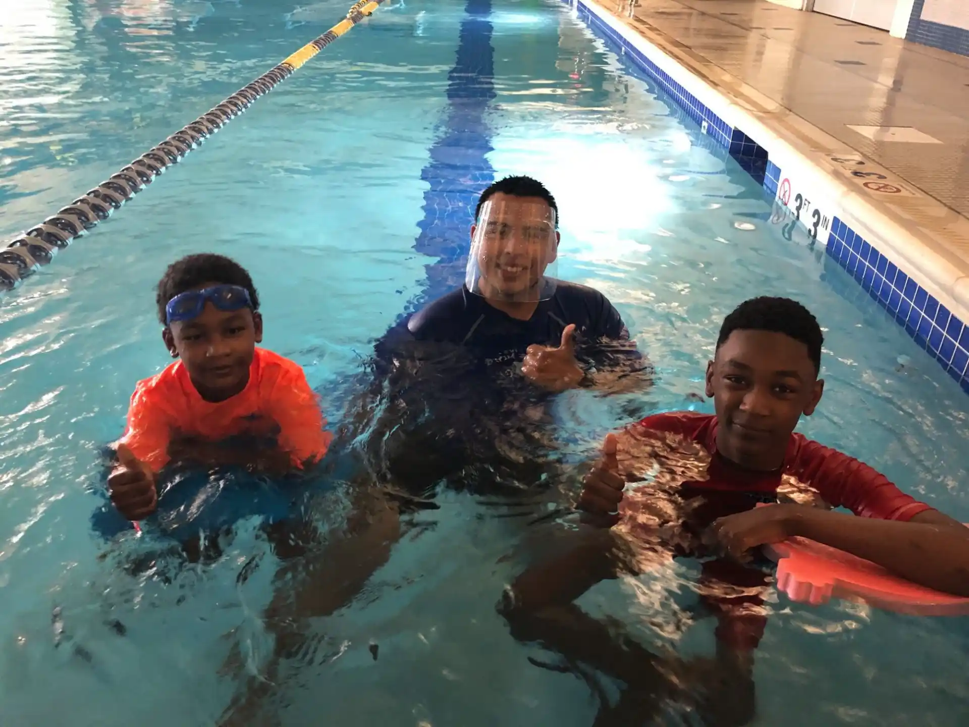 a group of people in a pool