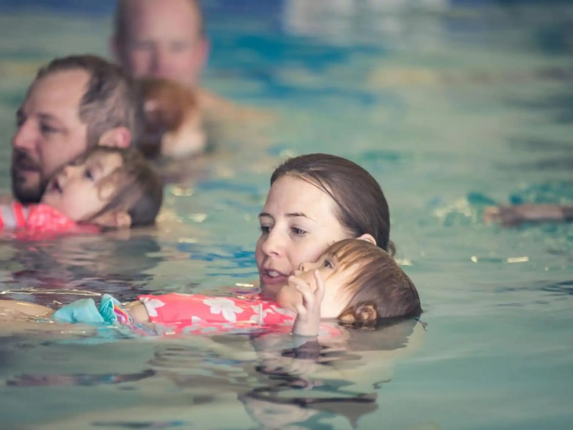 a group of people in the water