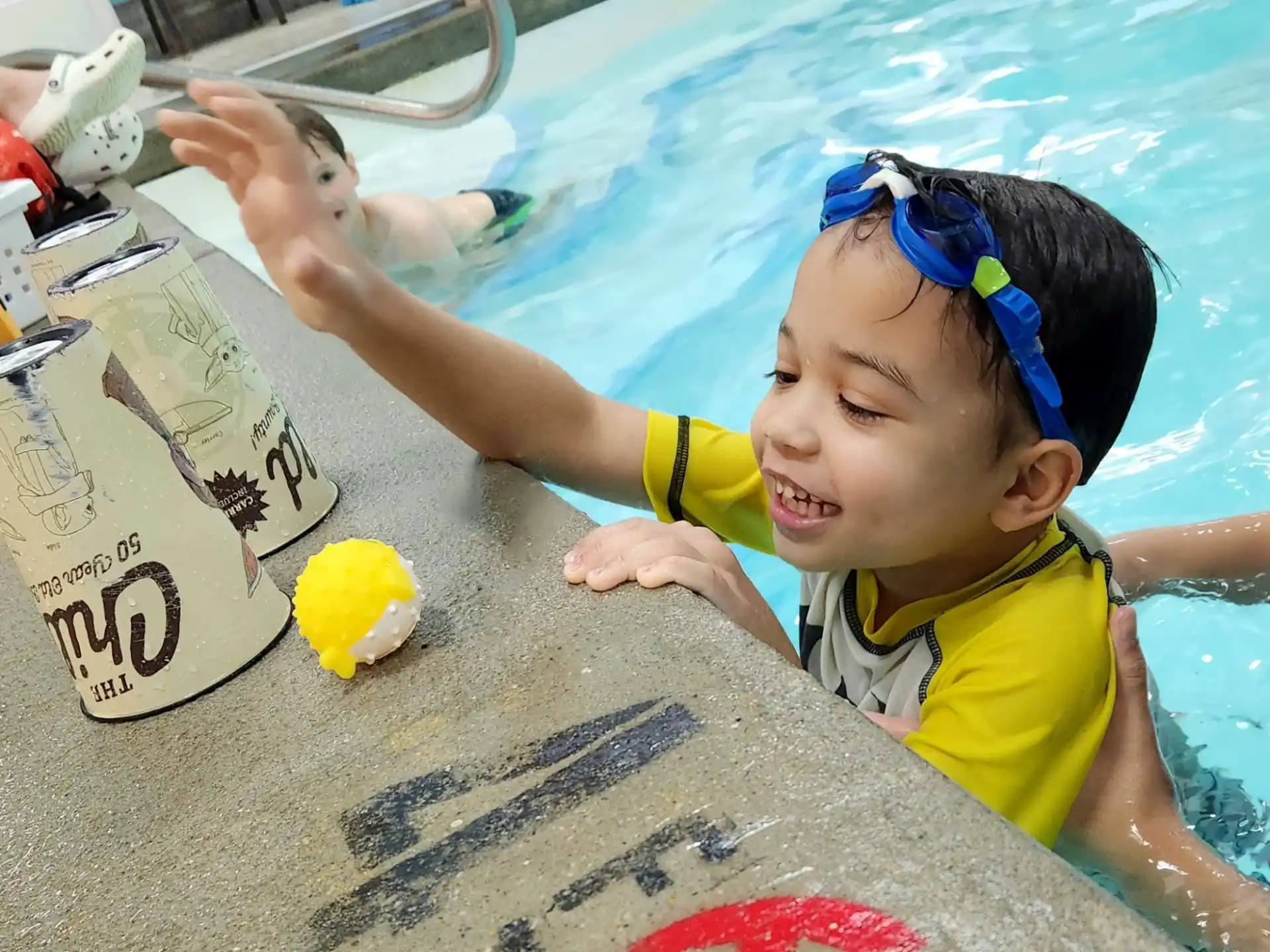 a child in a pool