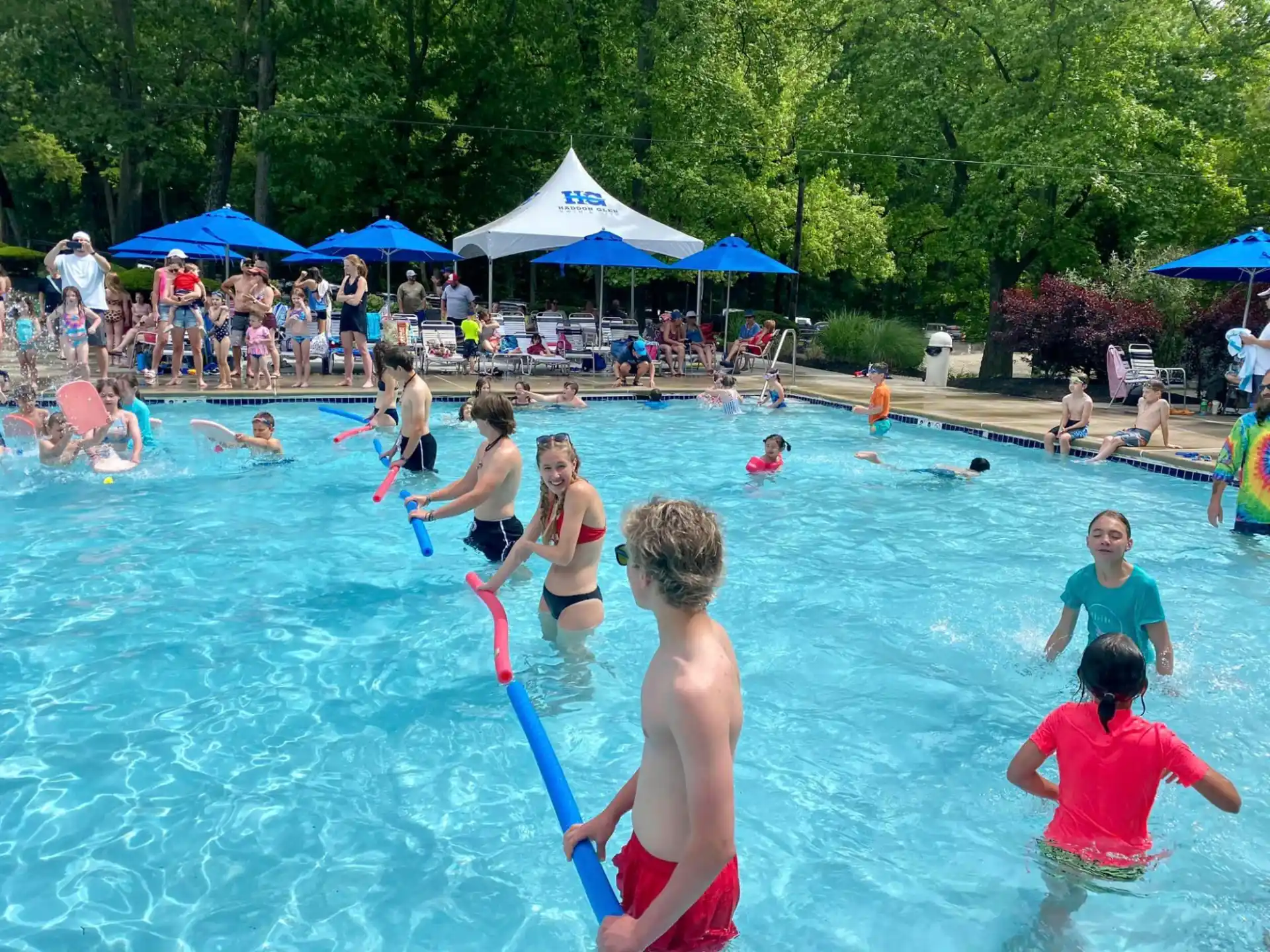 a group of people in a pool