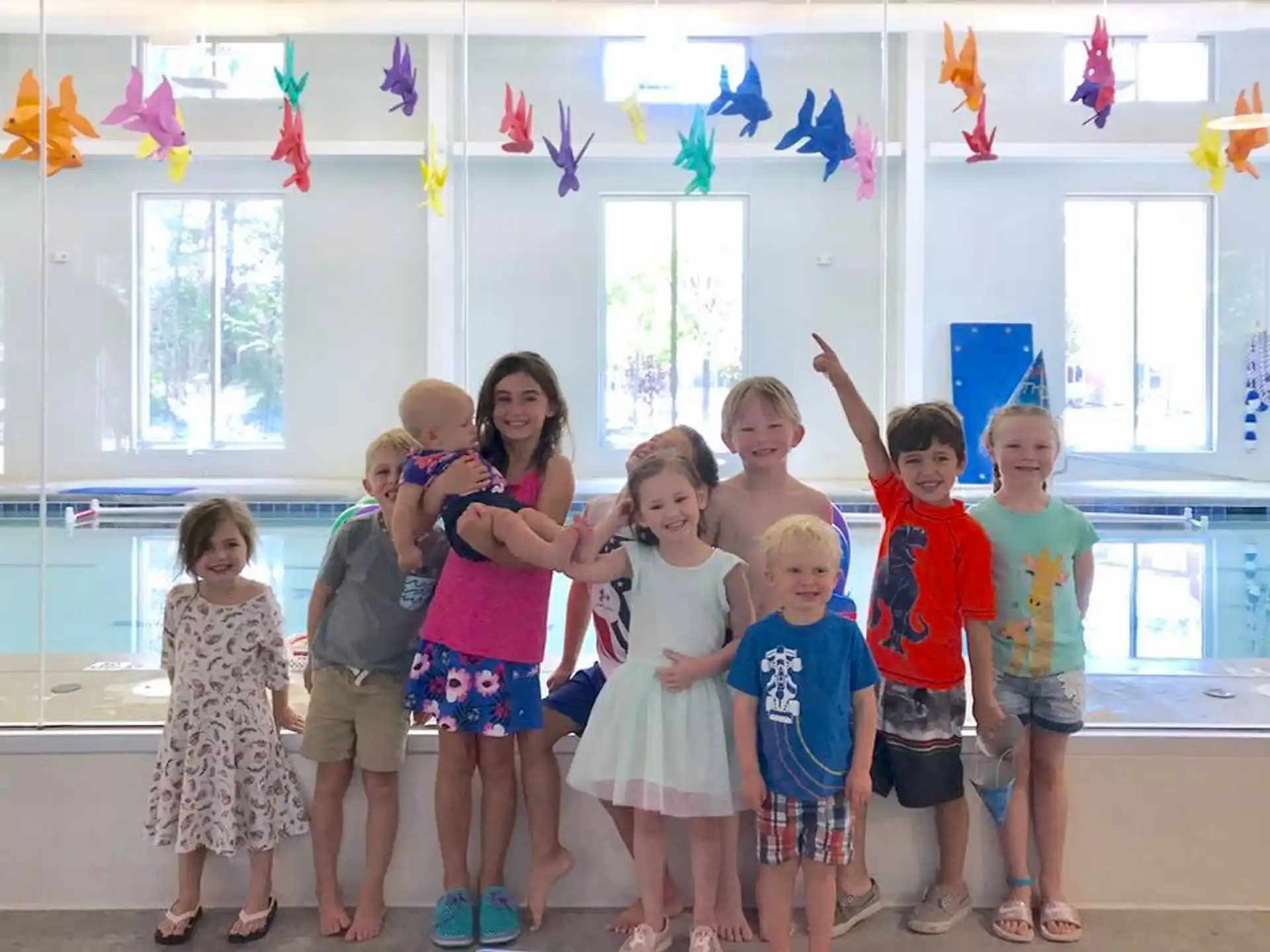 a group of children posing for a photo