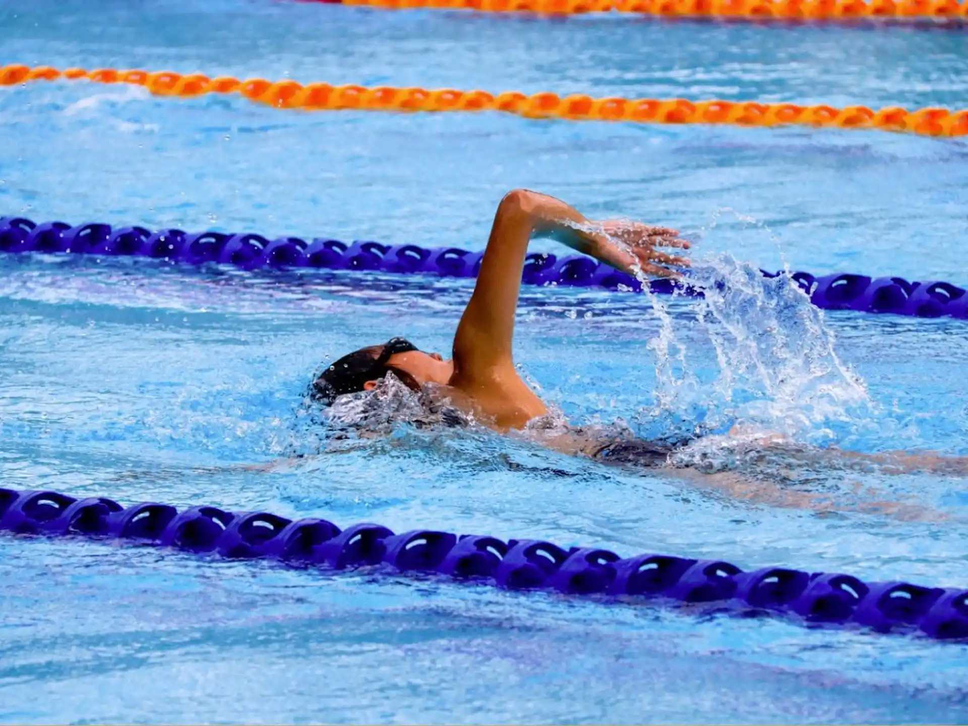 a person swimming in a pool