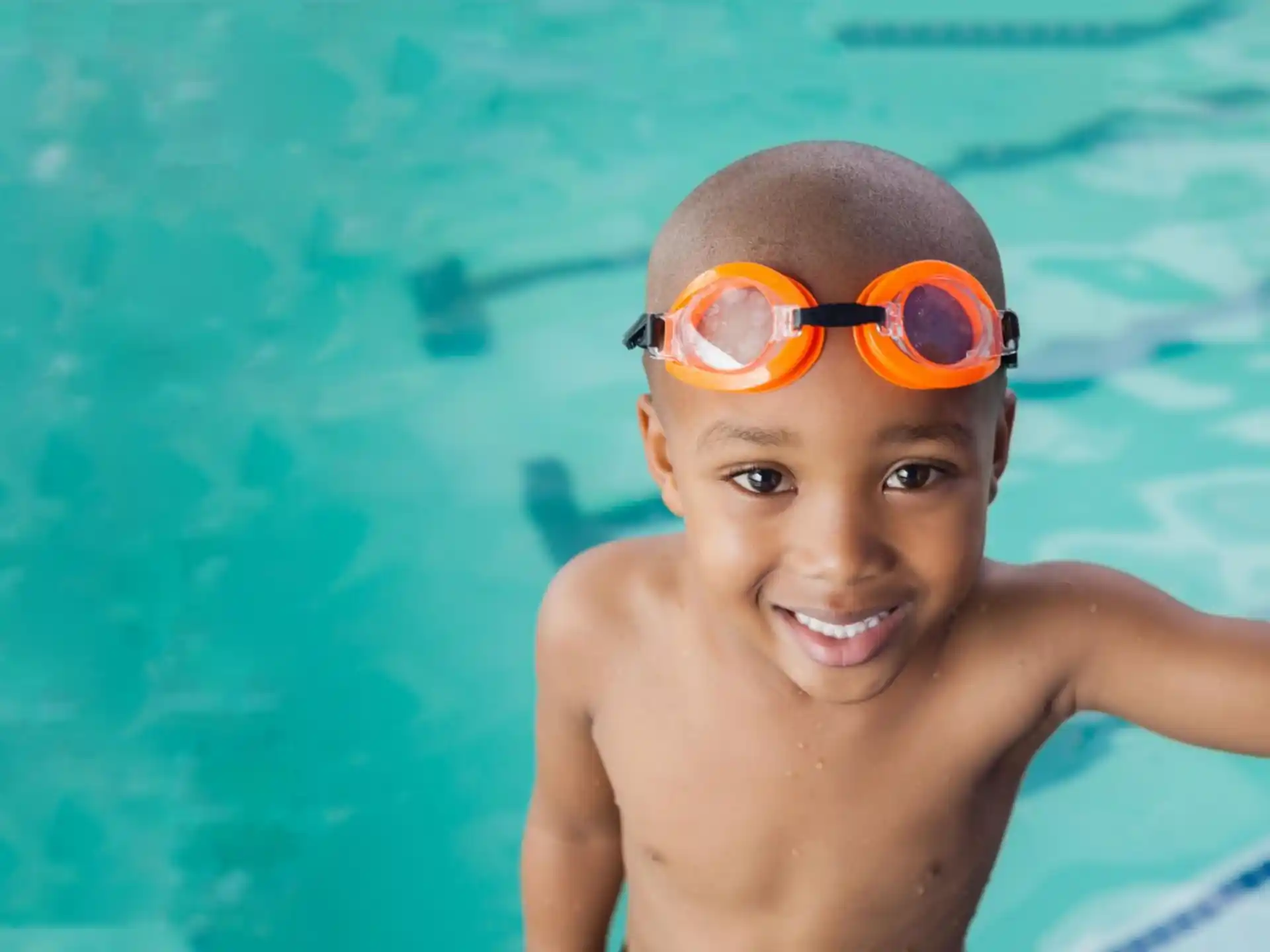 a boy in a pool