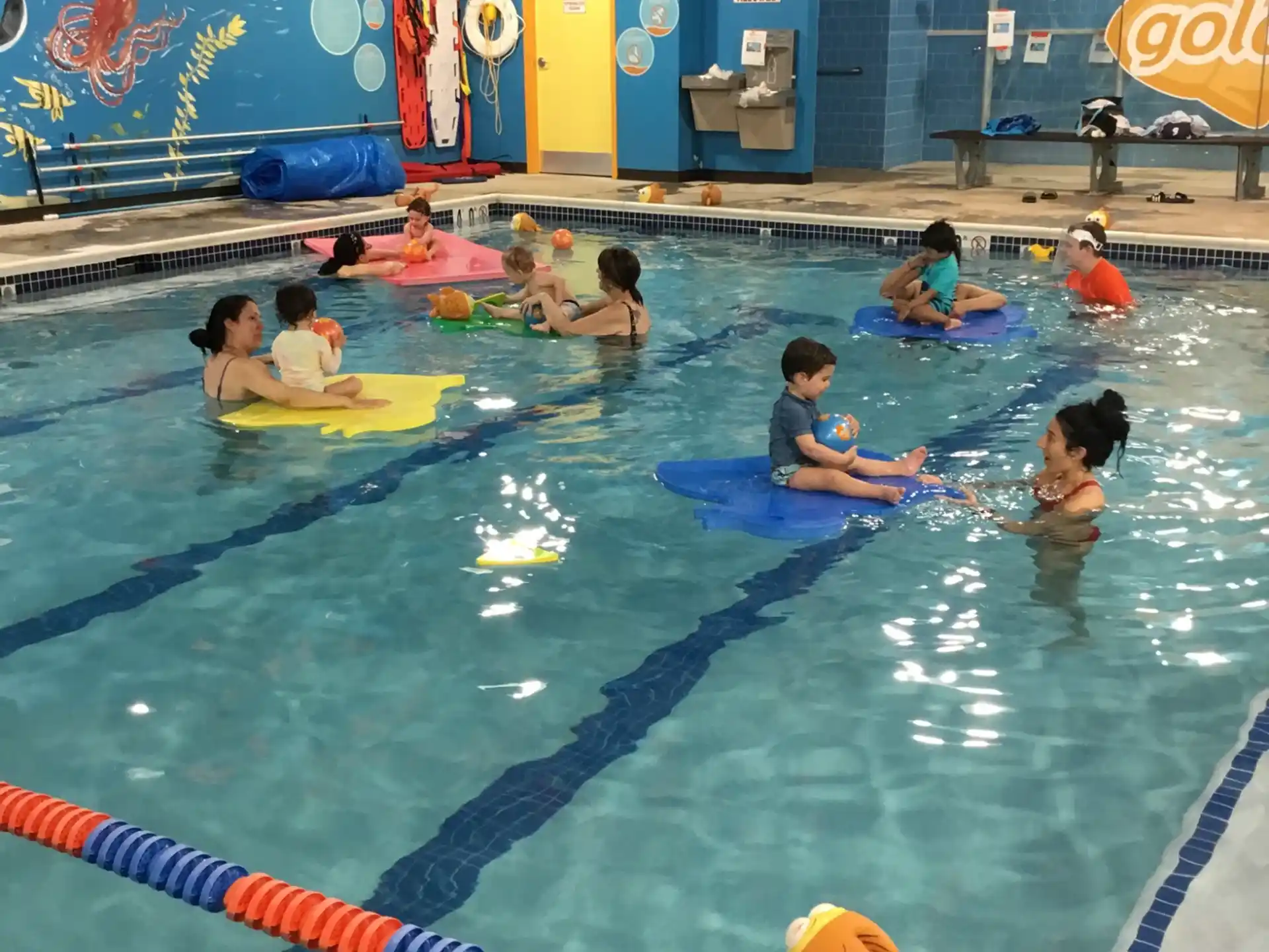 a group of people in a pool