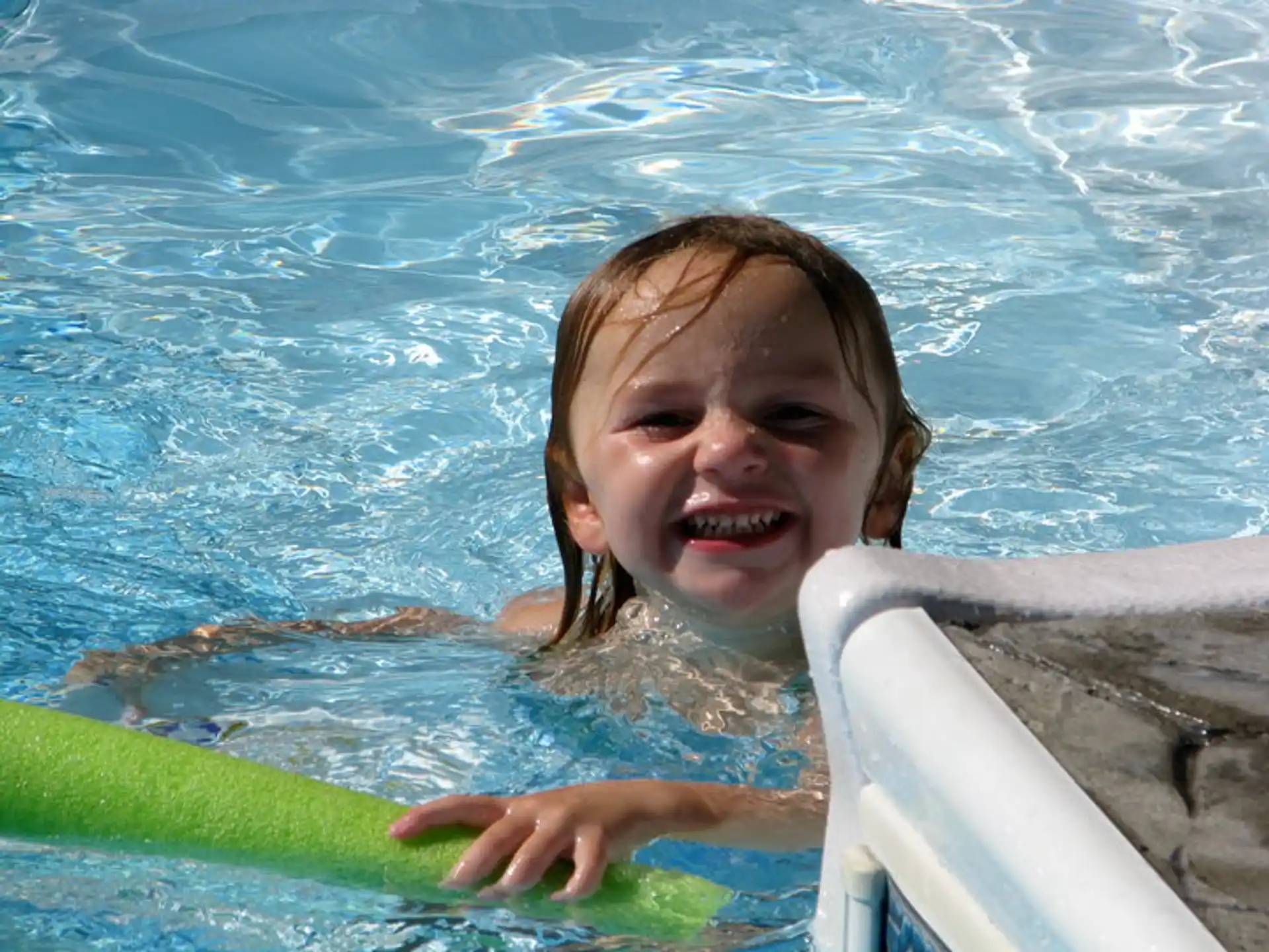 a girl in a pool