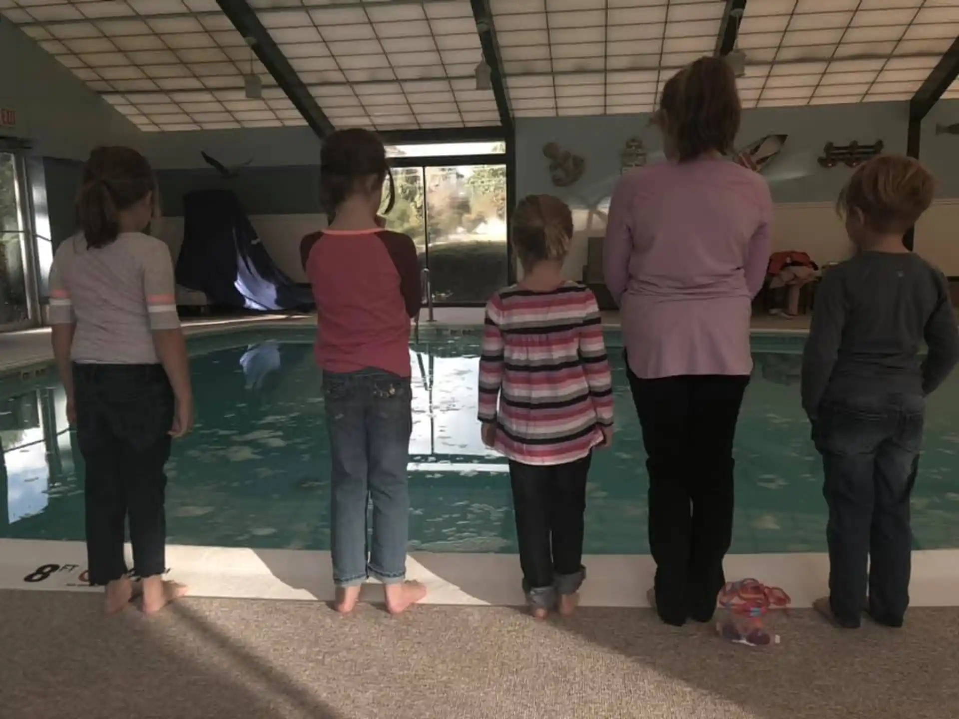 a group of people standing in a room
