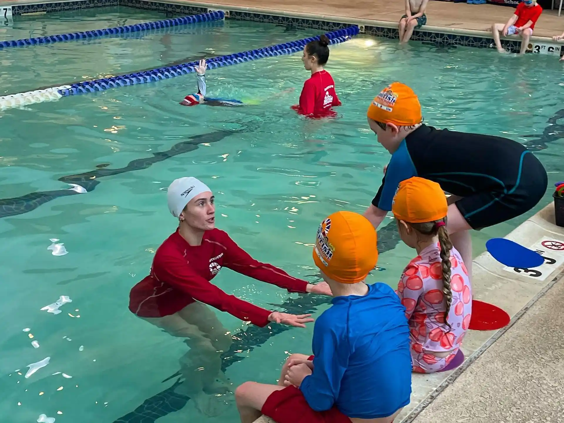 a group of people in a pool