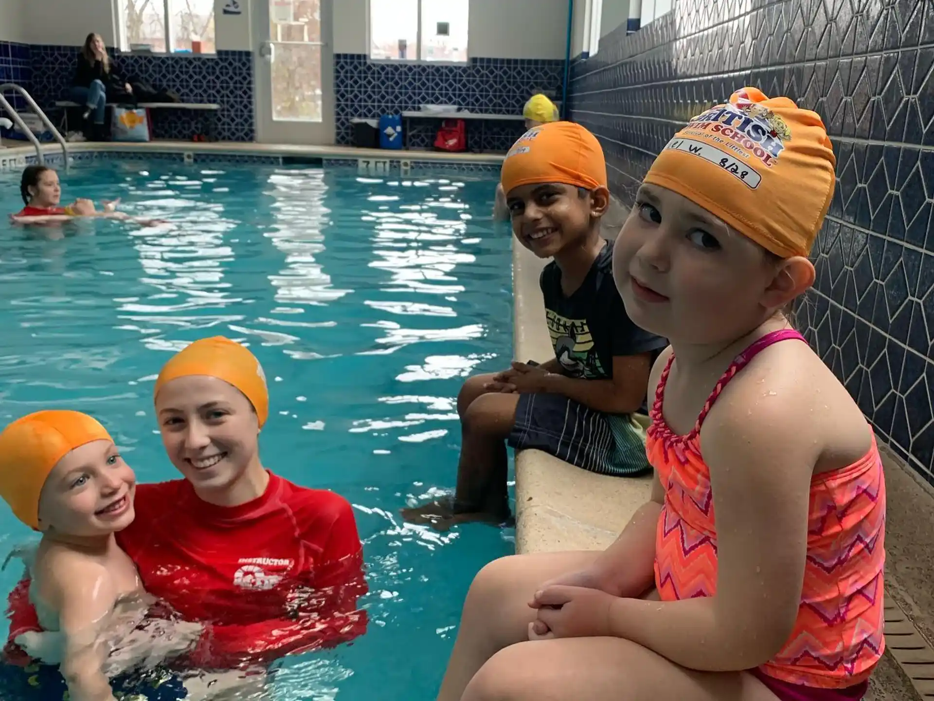 a group of people in a pool