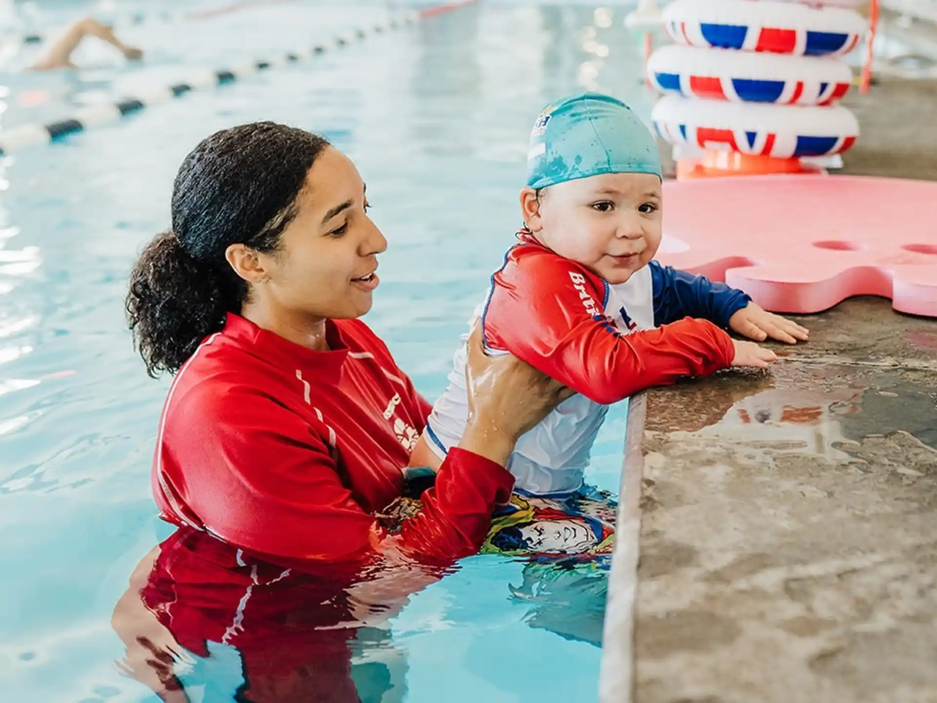 a person and a child in a pool