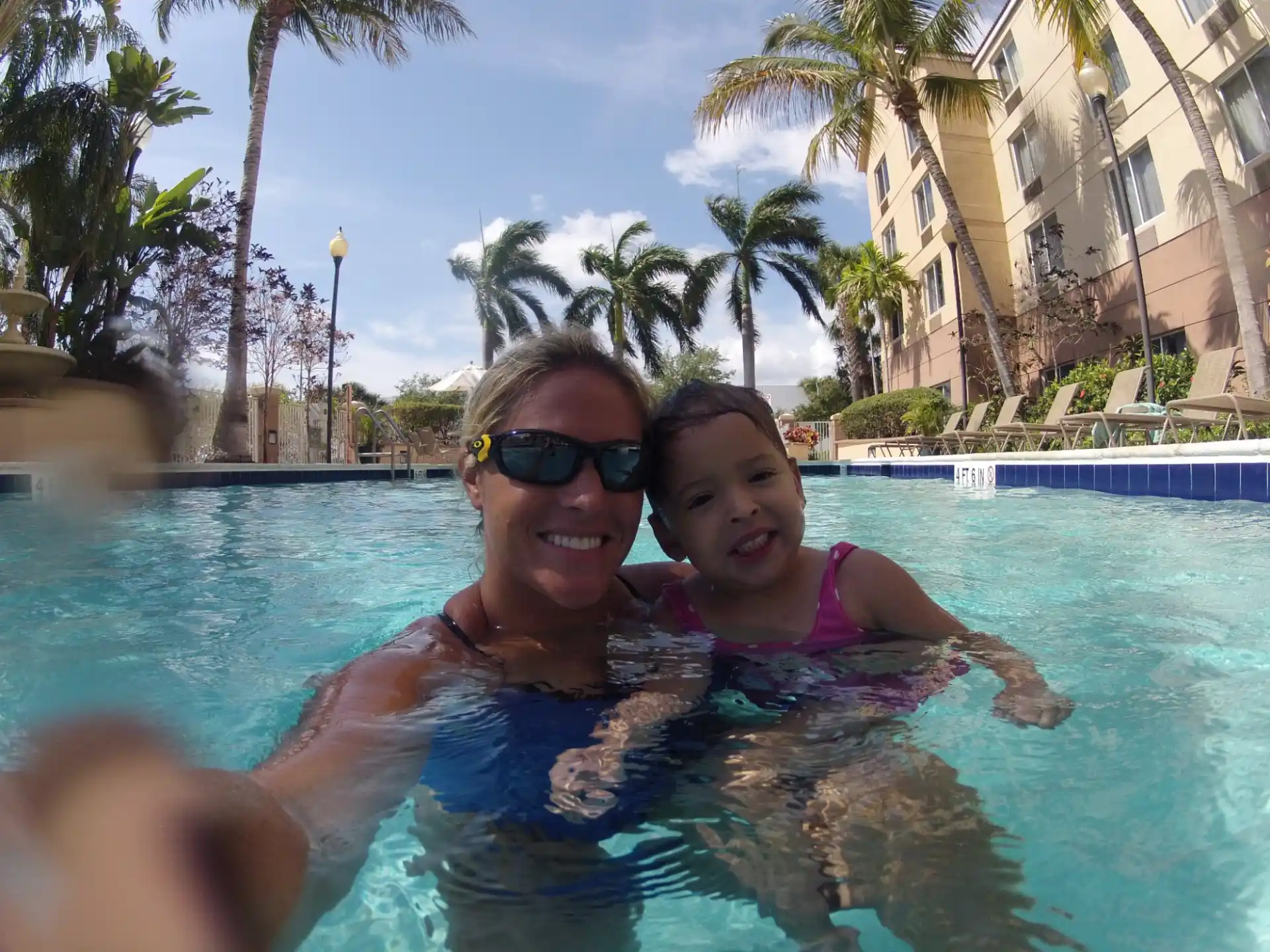 a man and a woman in a pool