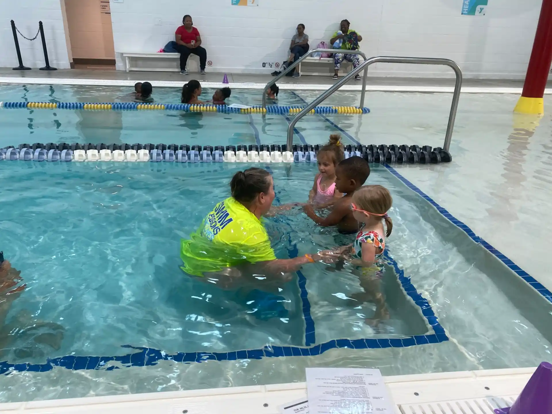 a group of people in a pool