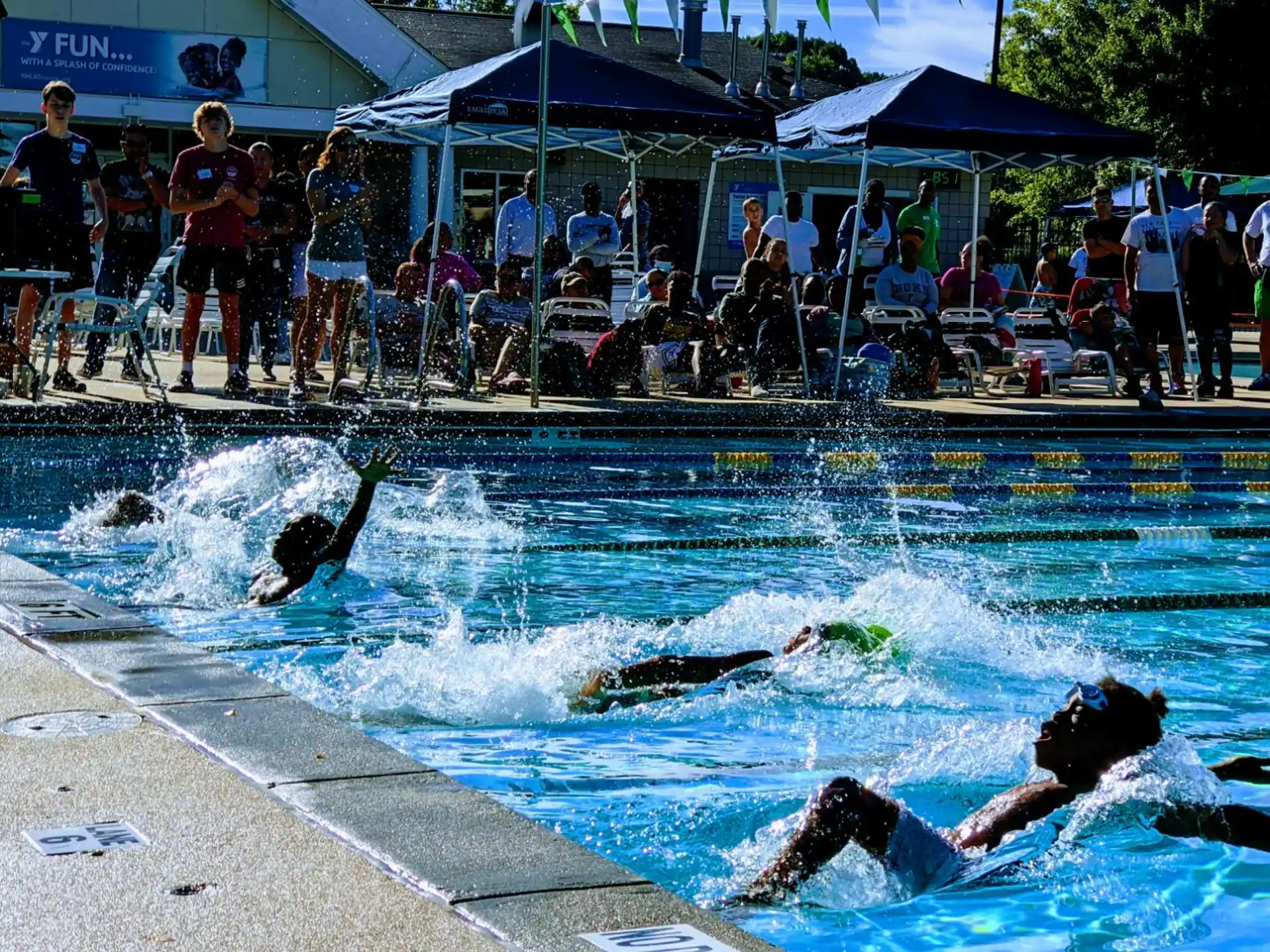 a group of people in a pool