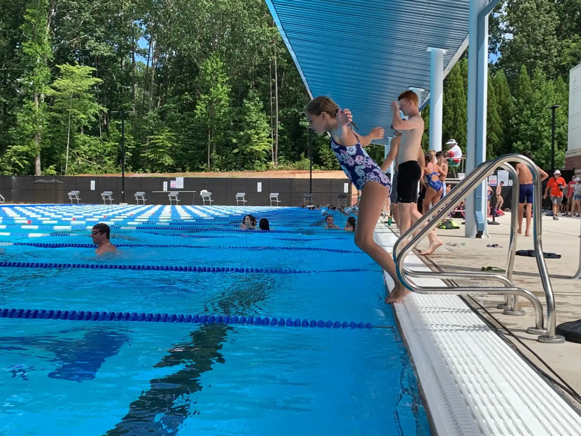 a group of people in a swimming pool