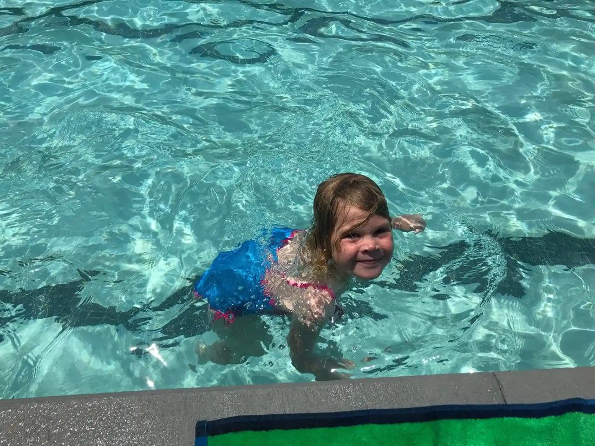 a man in a pool