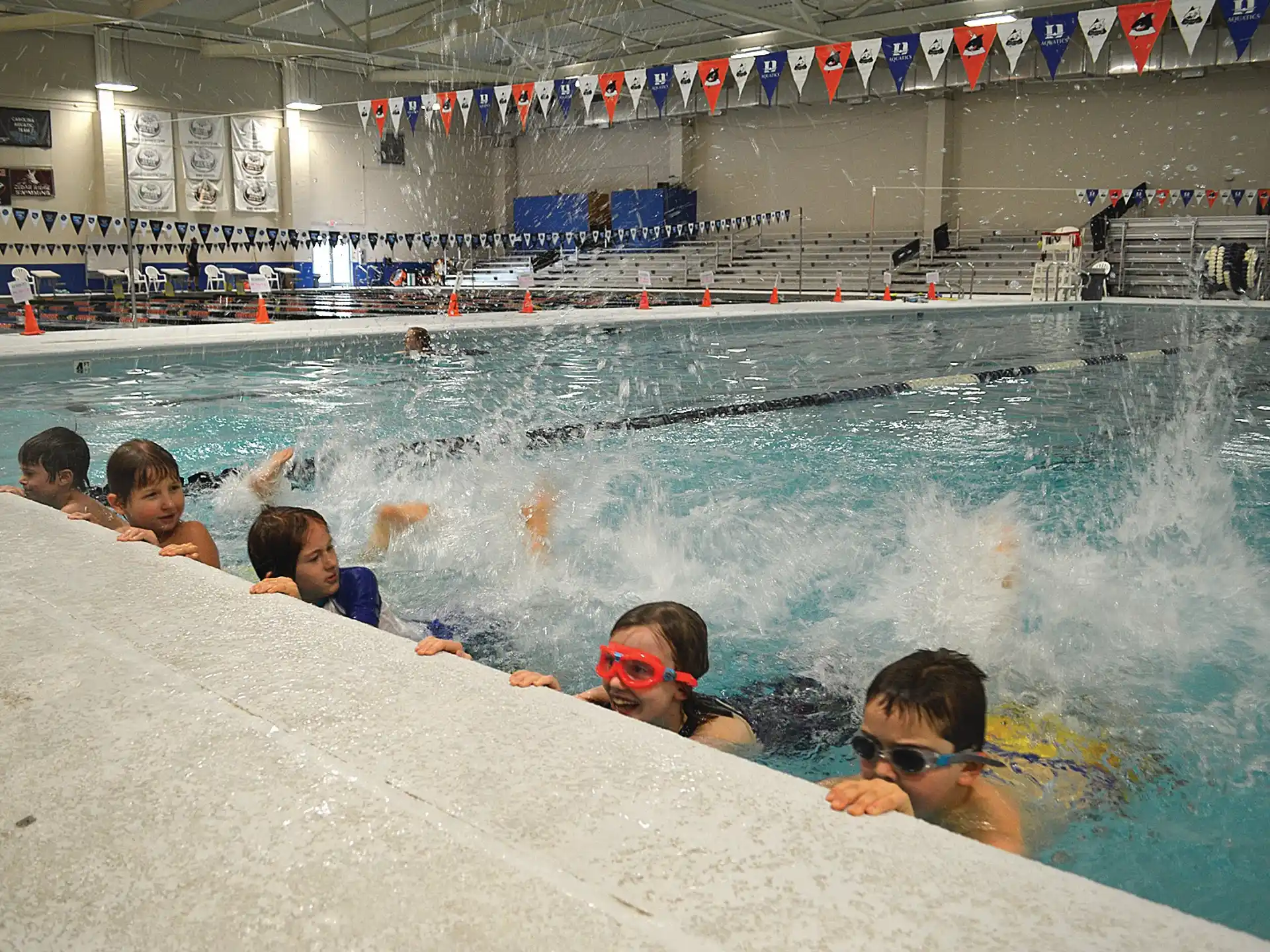 a group of people in a pool
