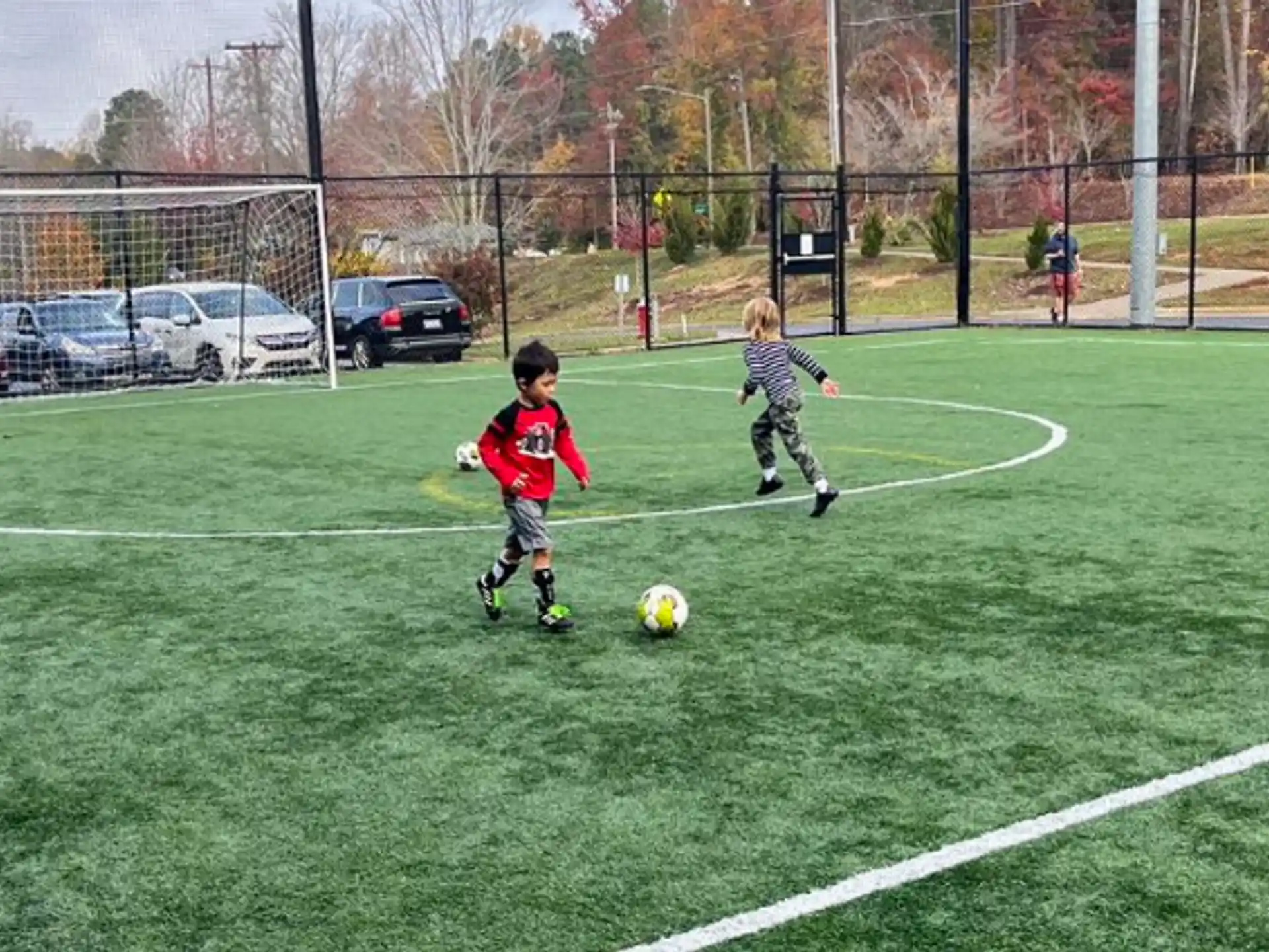 kids playing football on a field