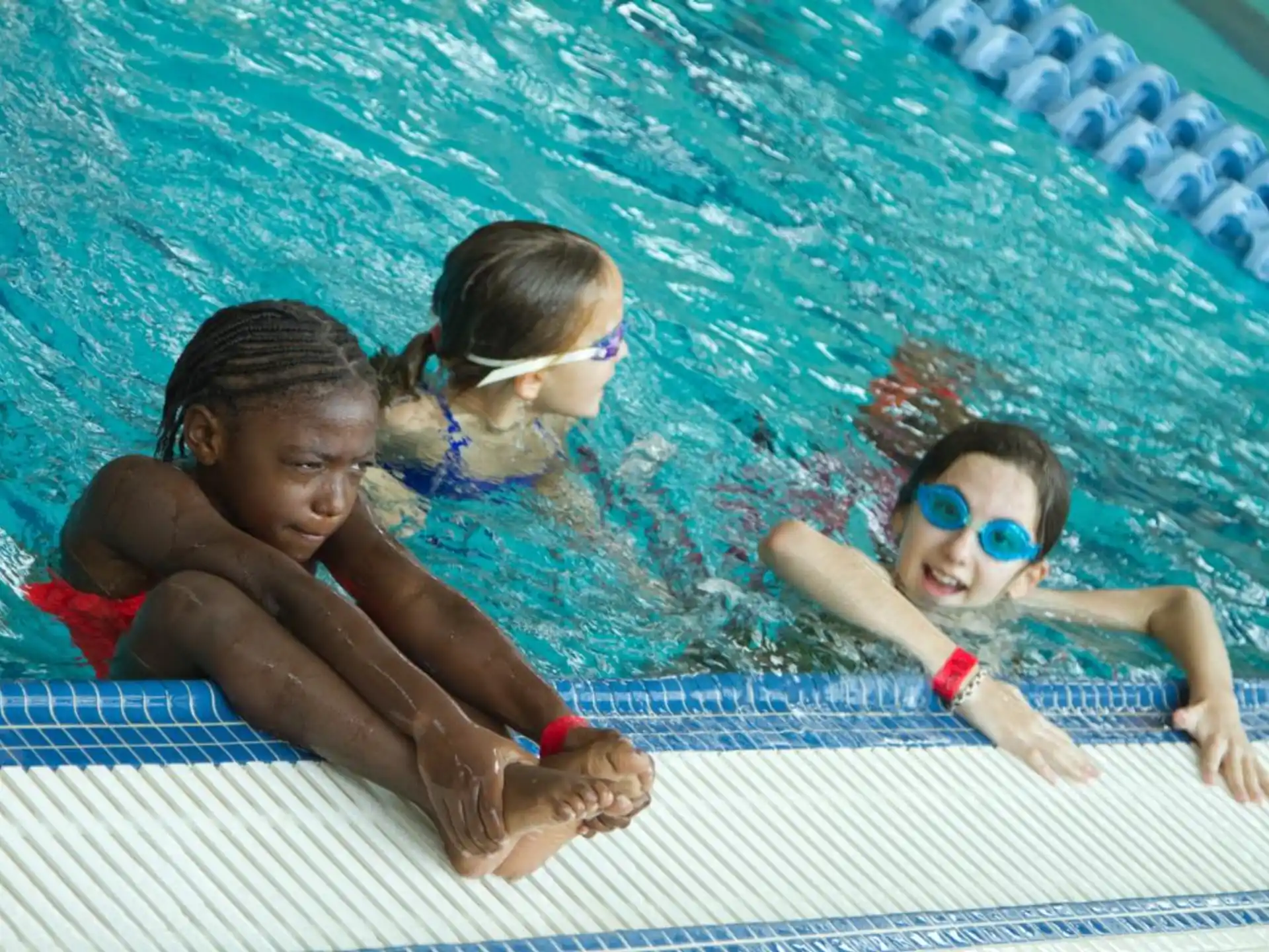 a group of people in a pool