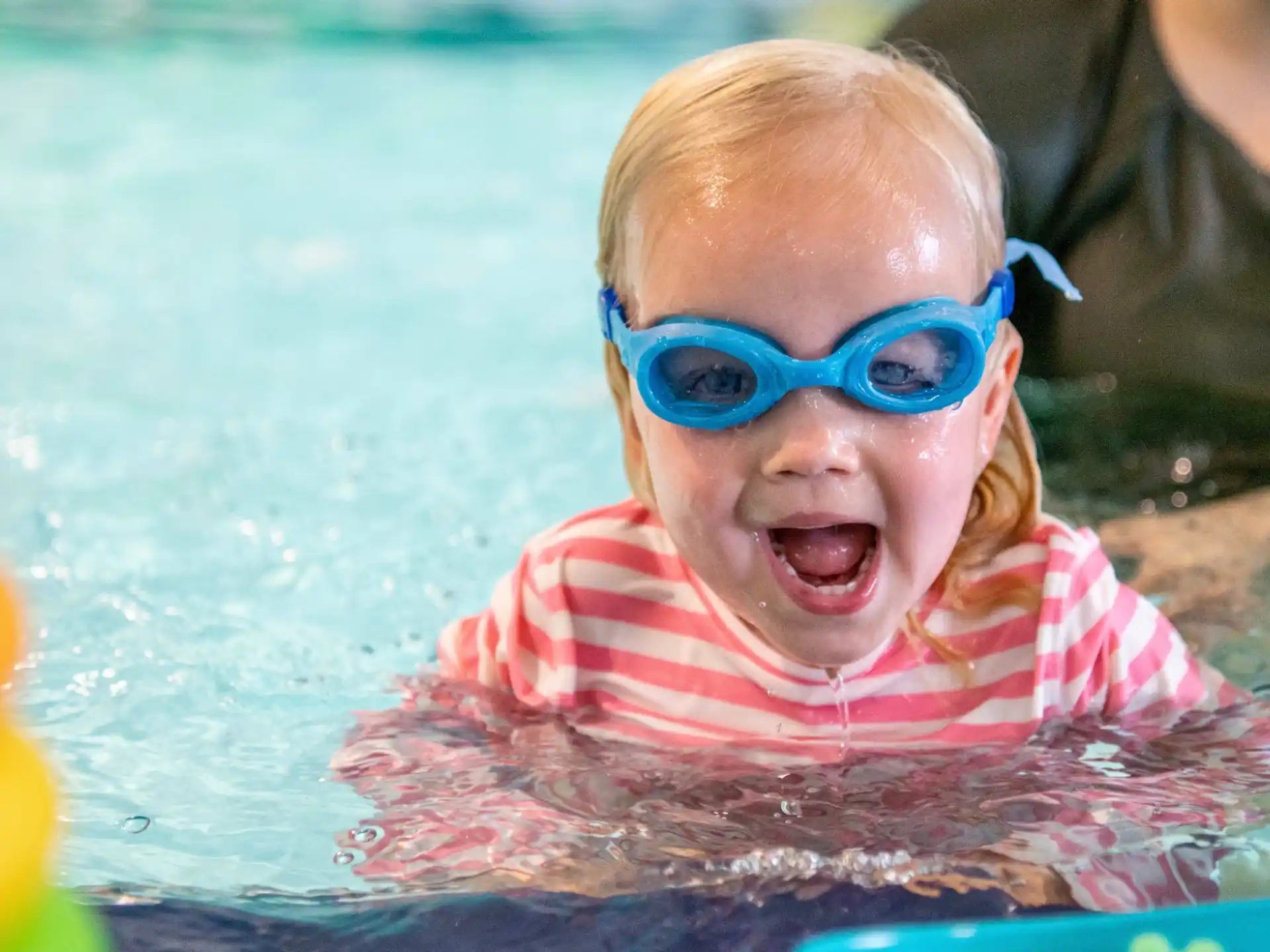 a baby in a pool