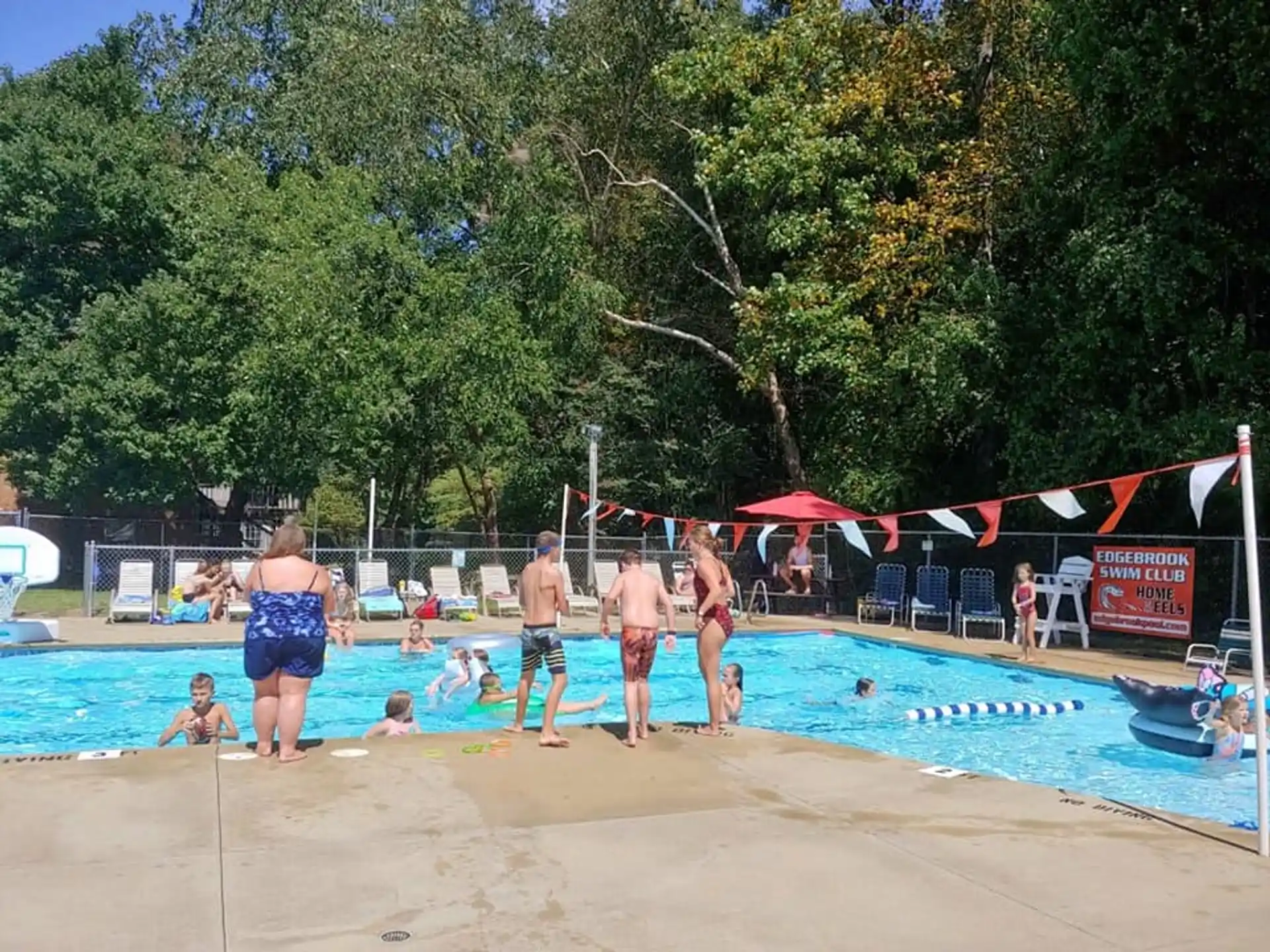 a group of people in a pool