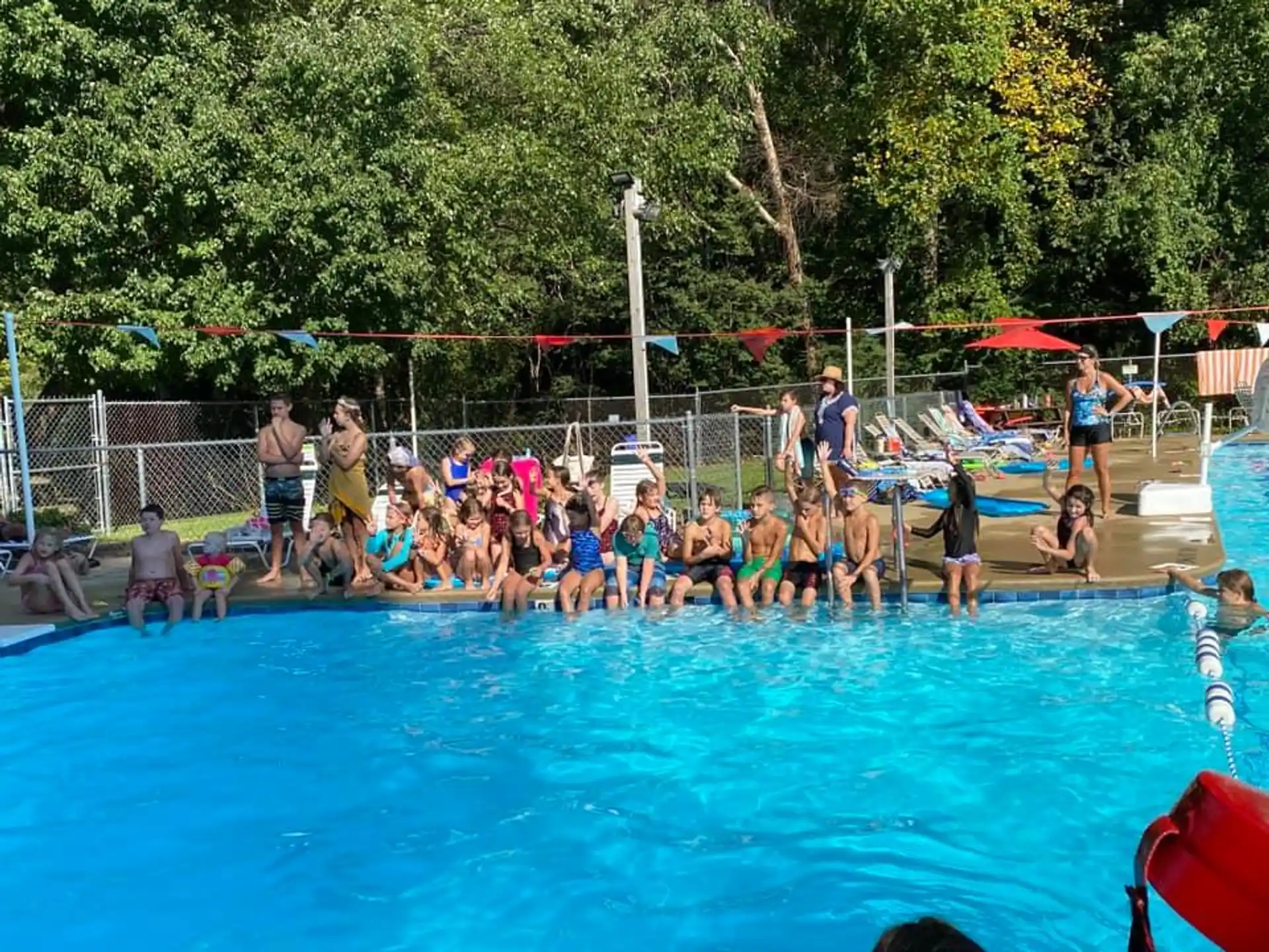 a group of people in a pool