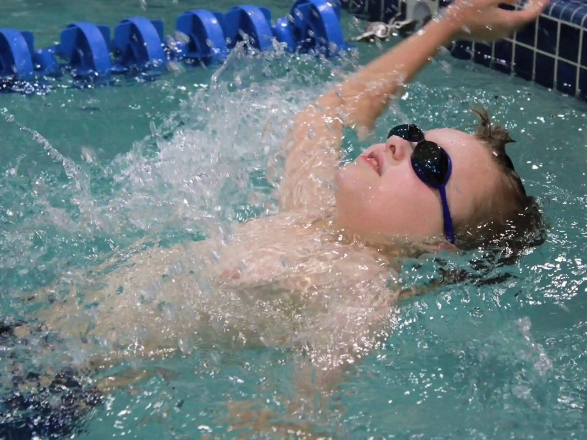 a person swimming in a pool