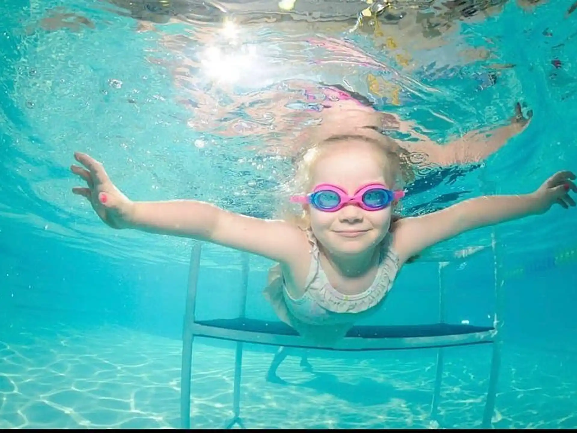 a girl in a pool