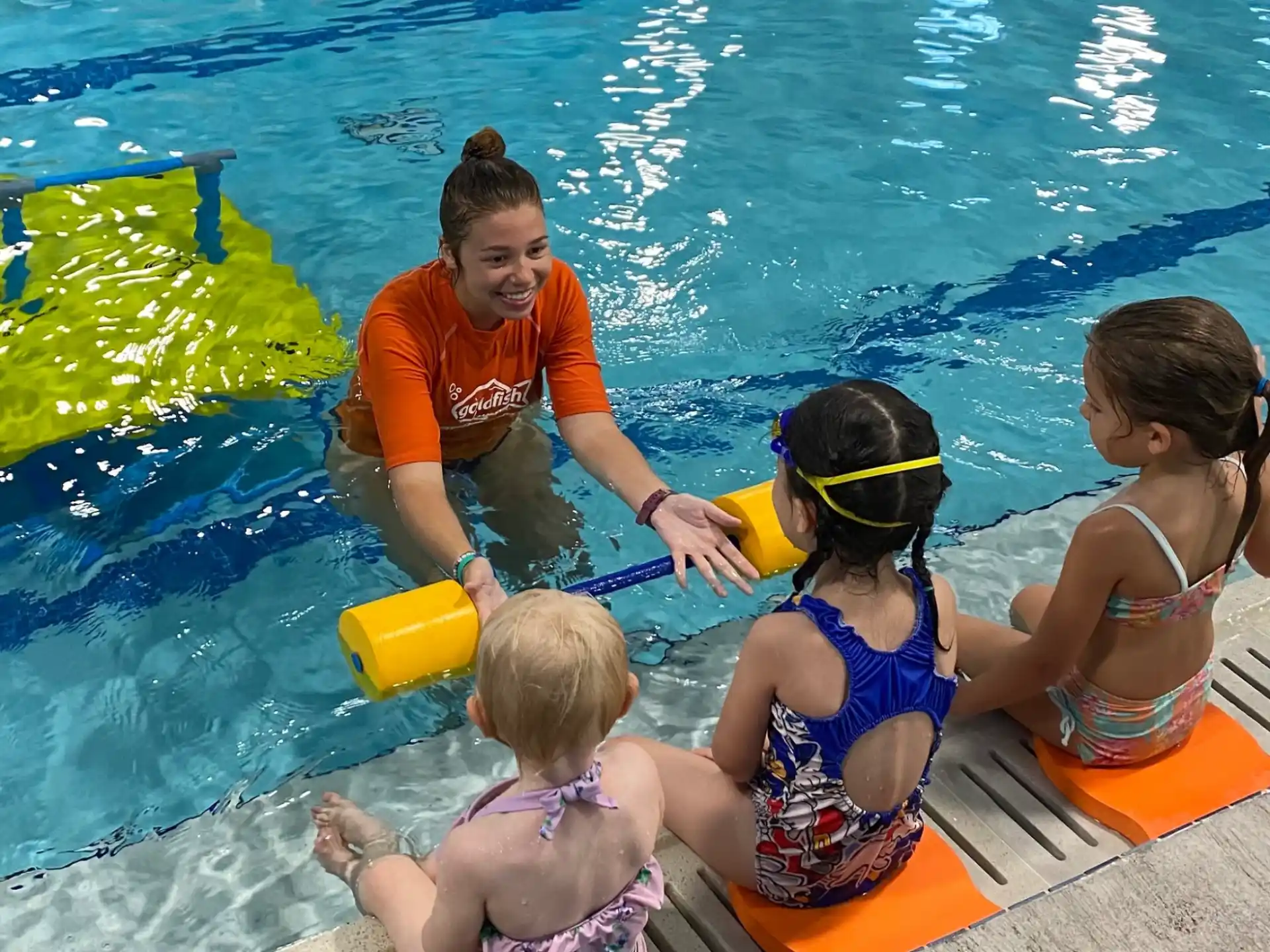 a group of people in a pool