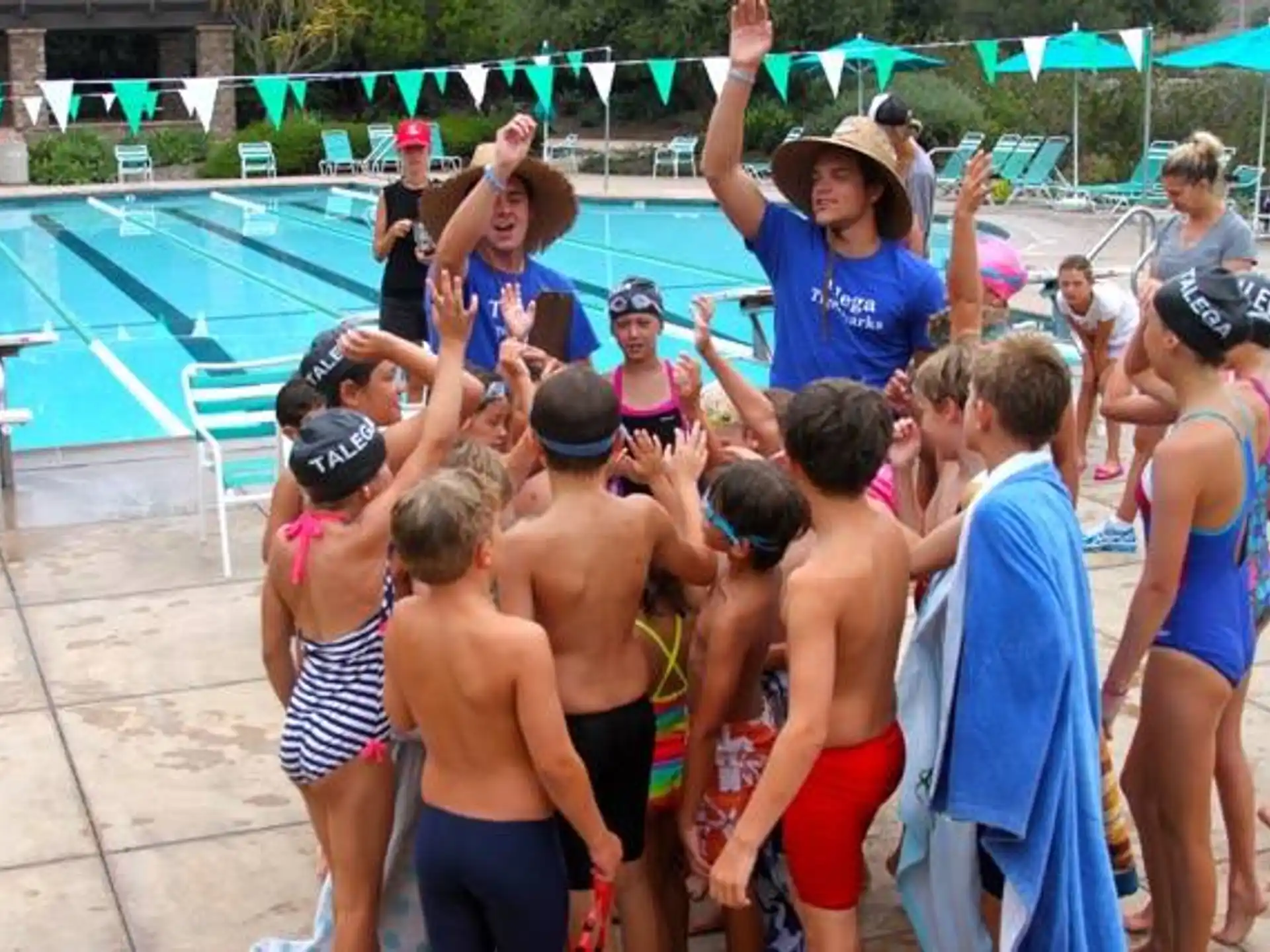 a group of people in a pool