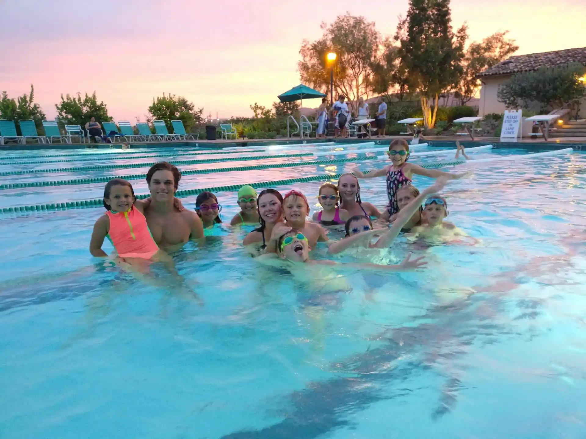 a group of people in a pool
