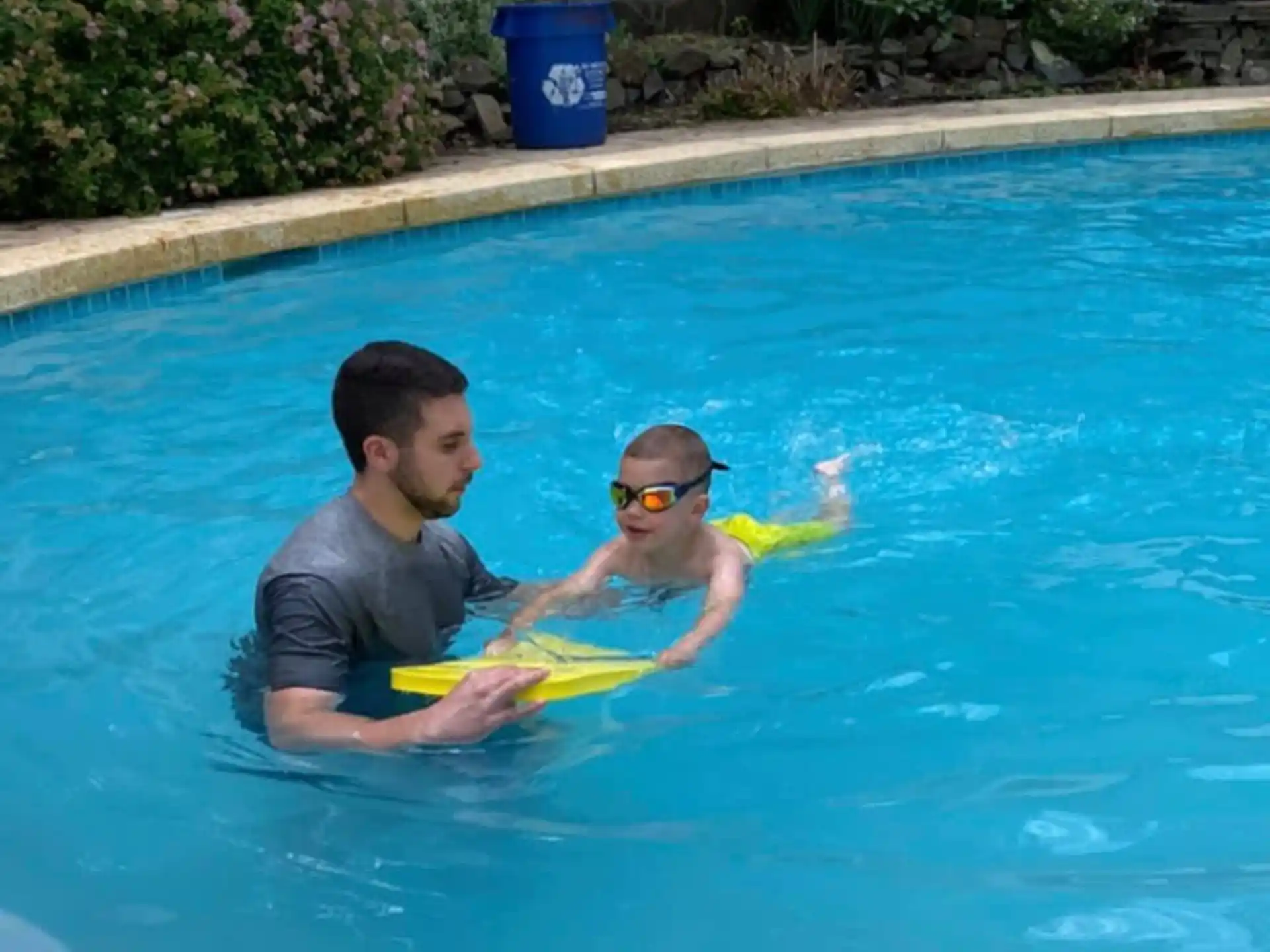 two men in a pool