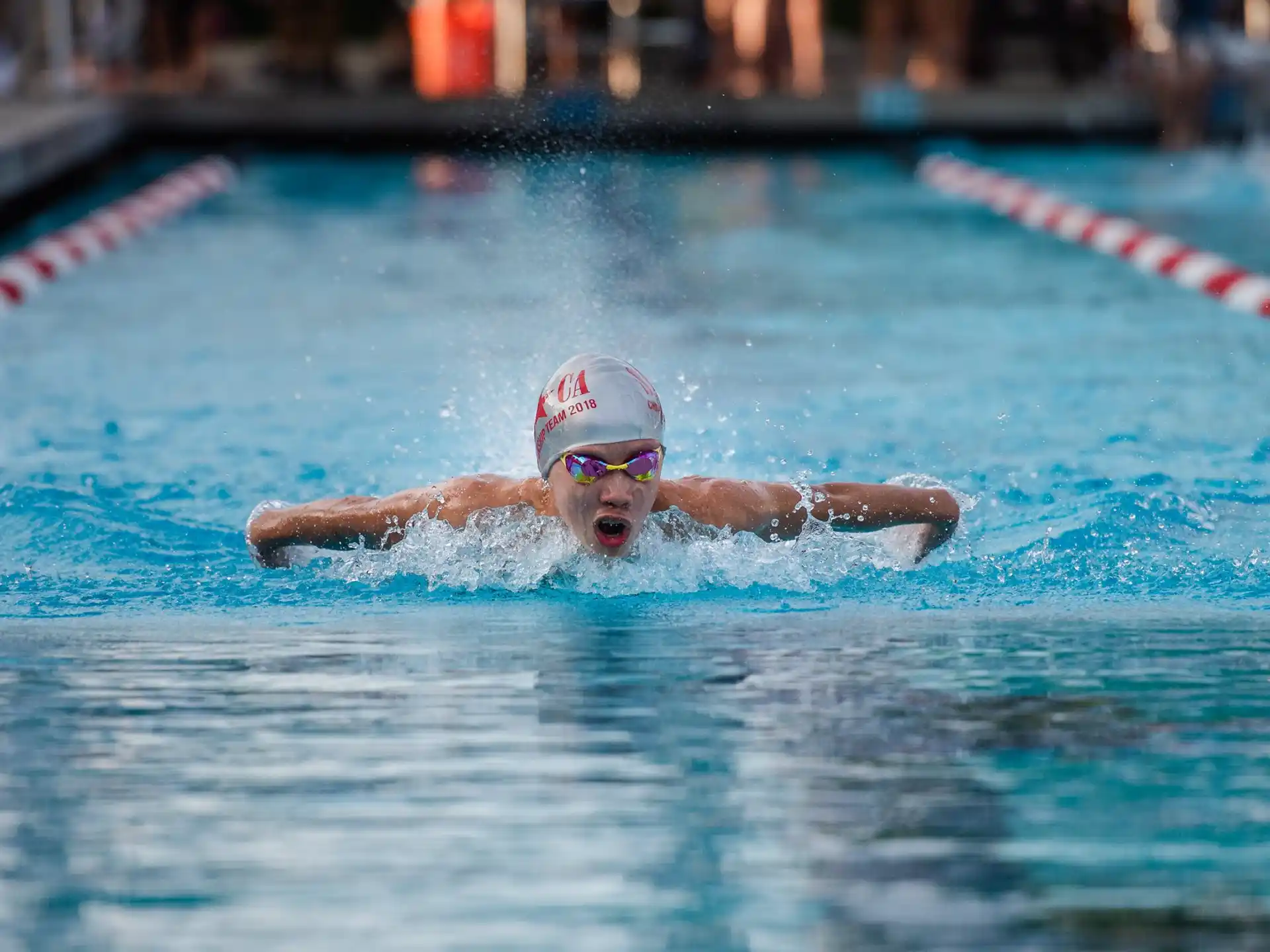a person swimming in a pool