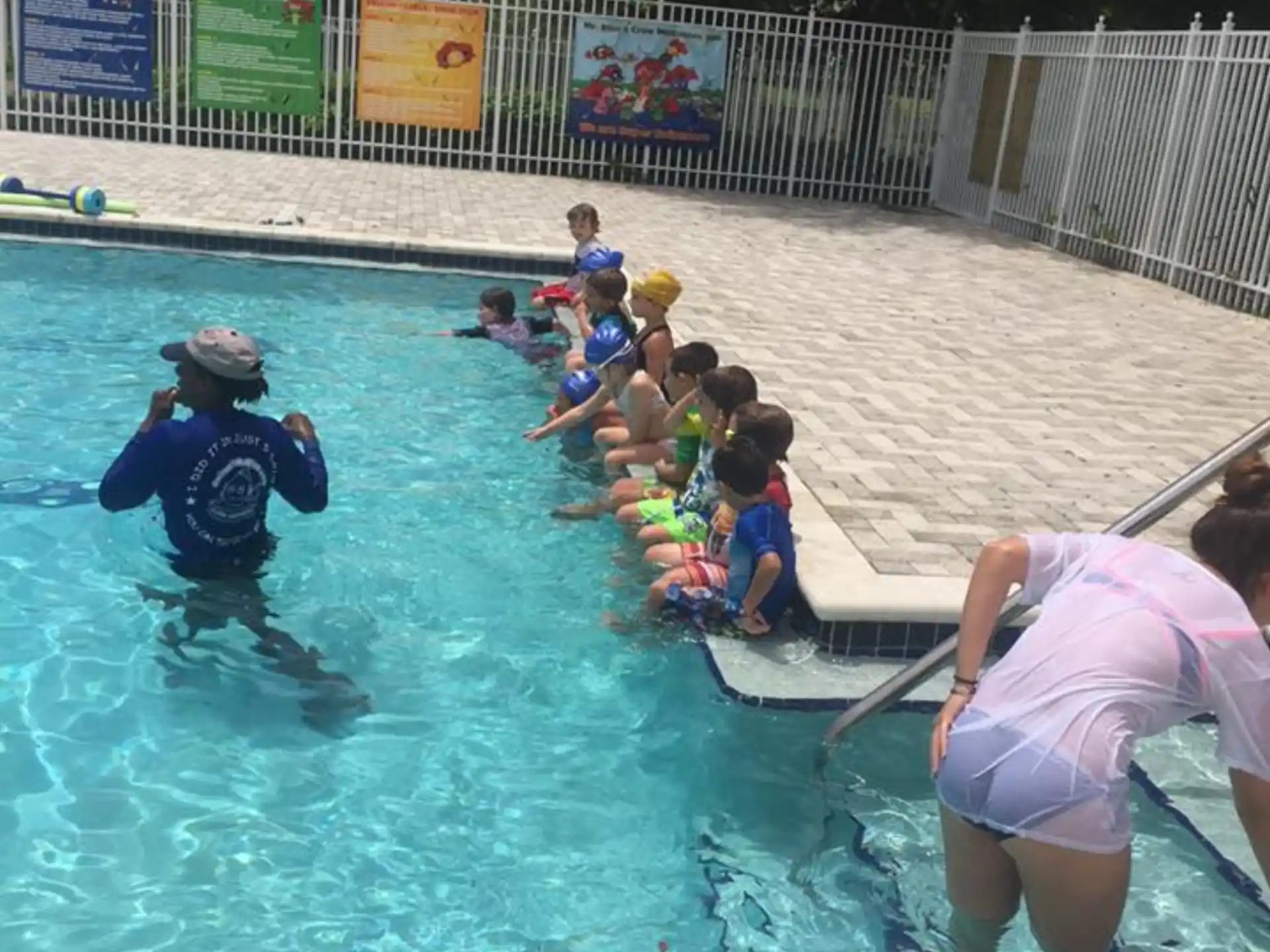a group of people in a pool