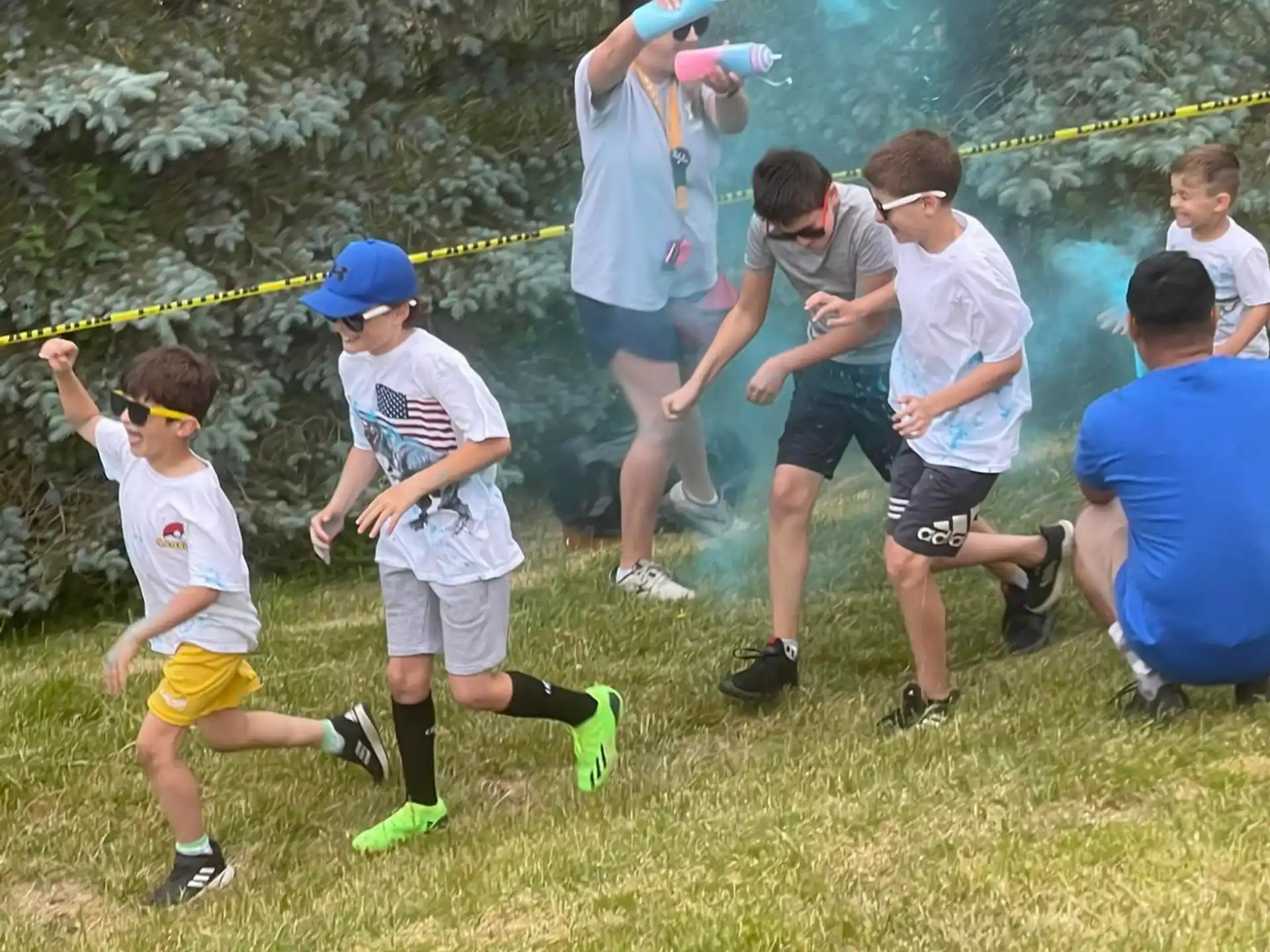 a group of people playing with a toy