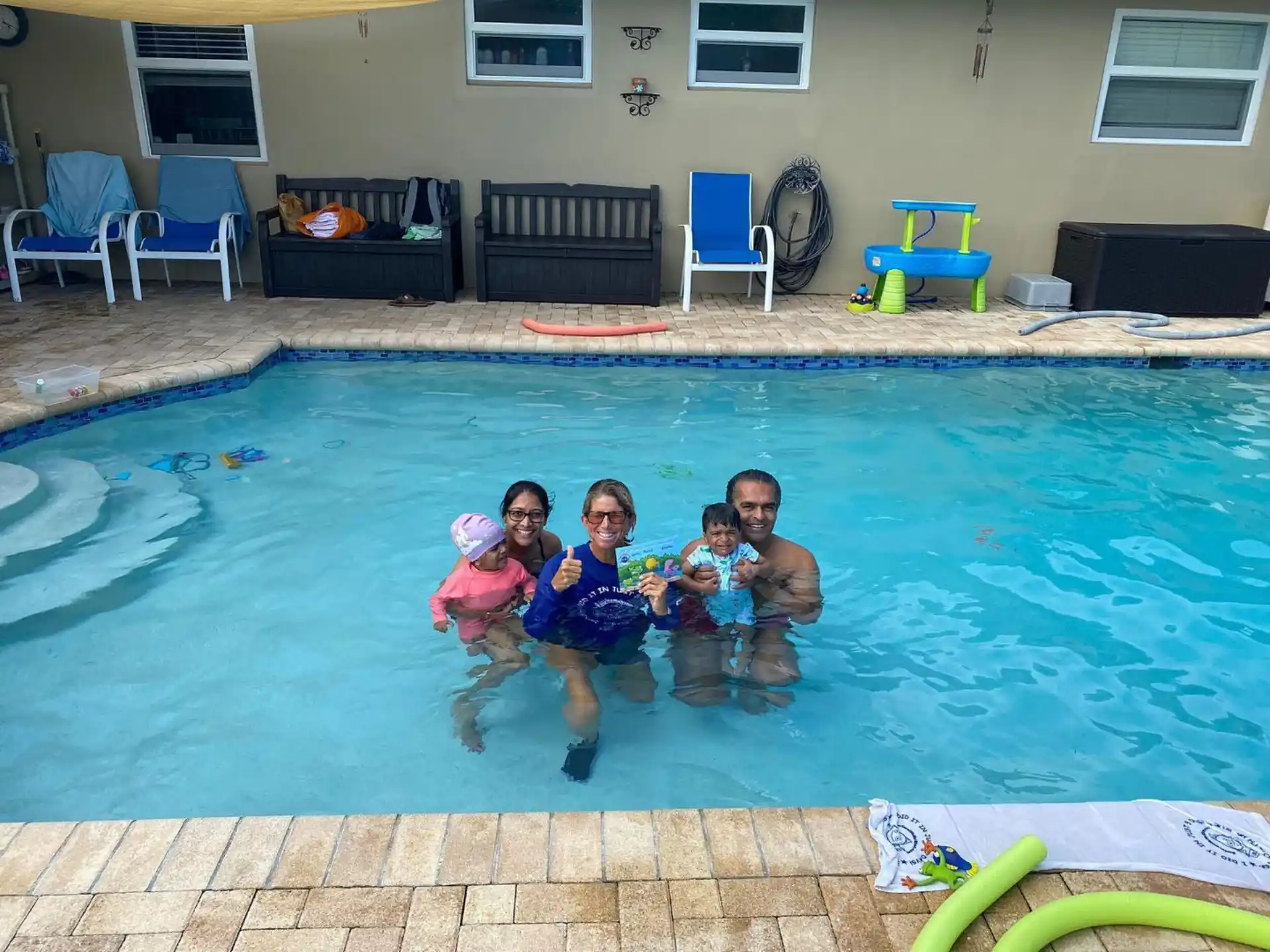 a group of people in a pool