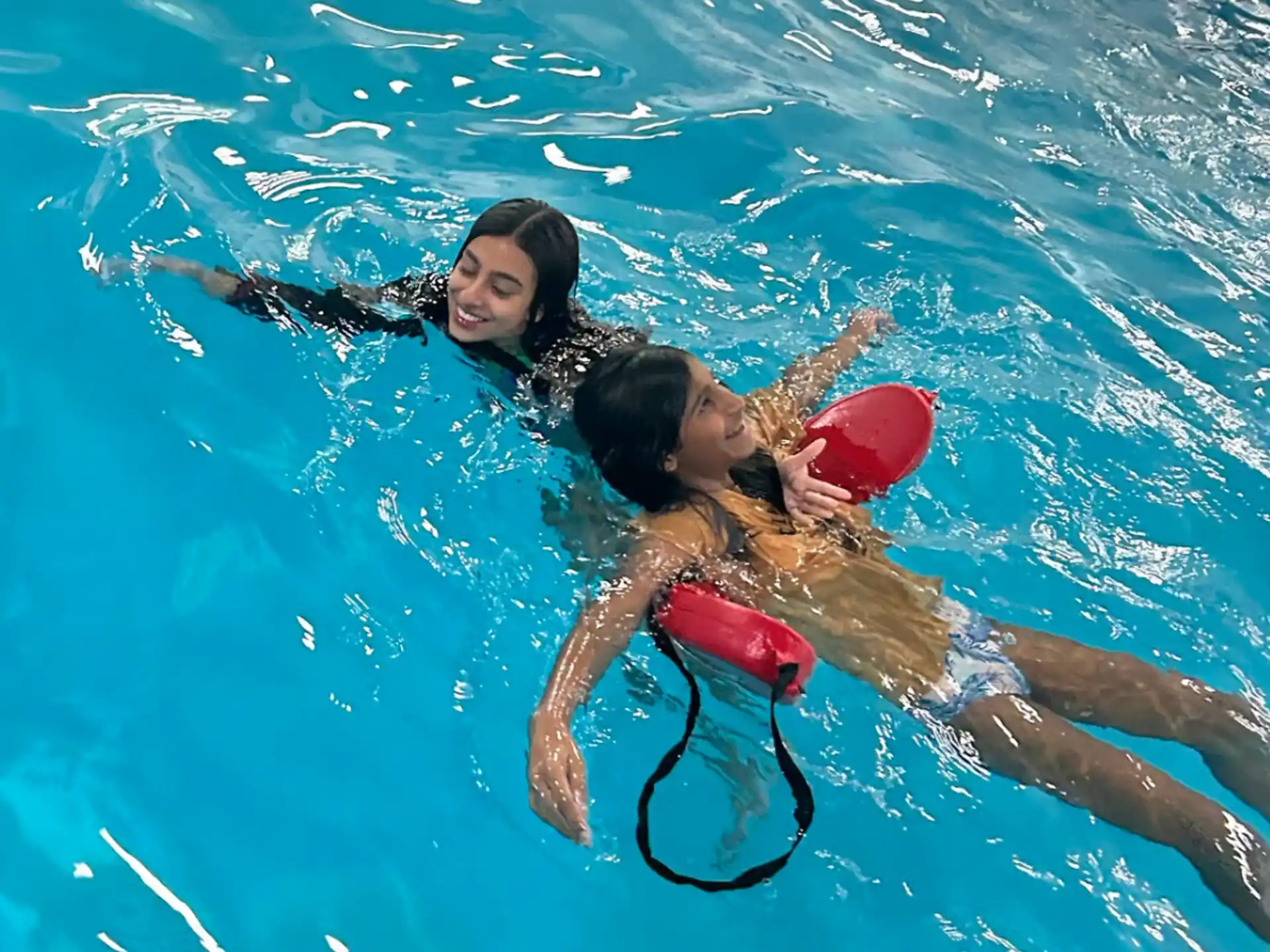 two women in a pool