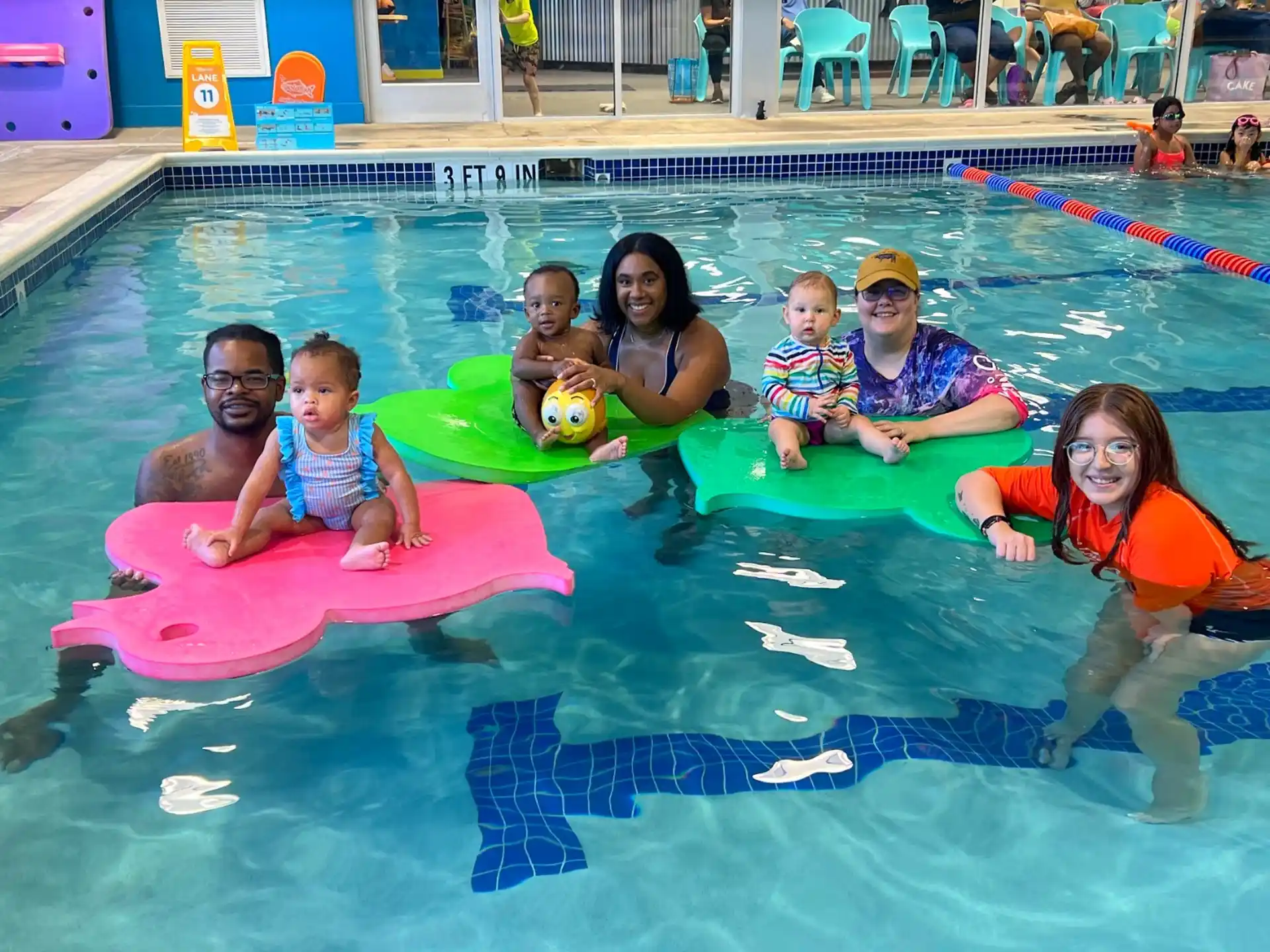 a group of people in a pool