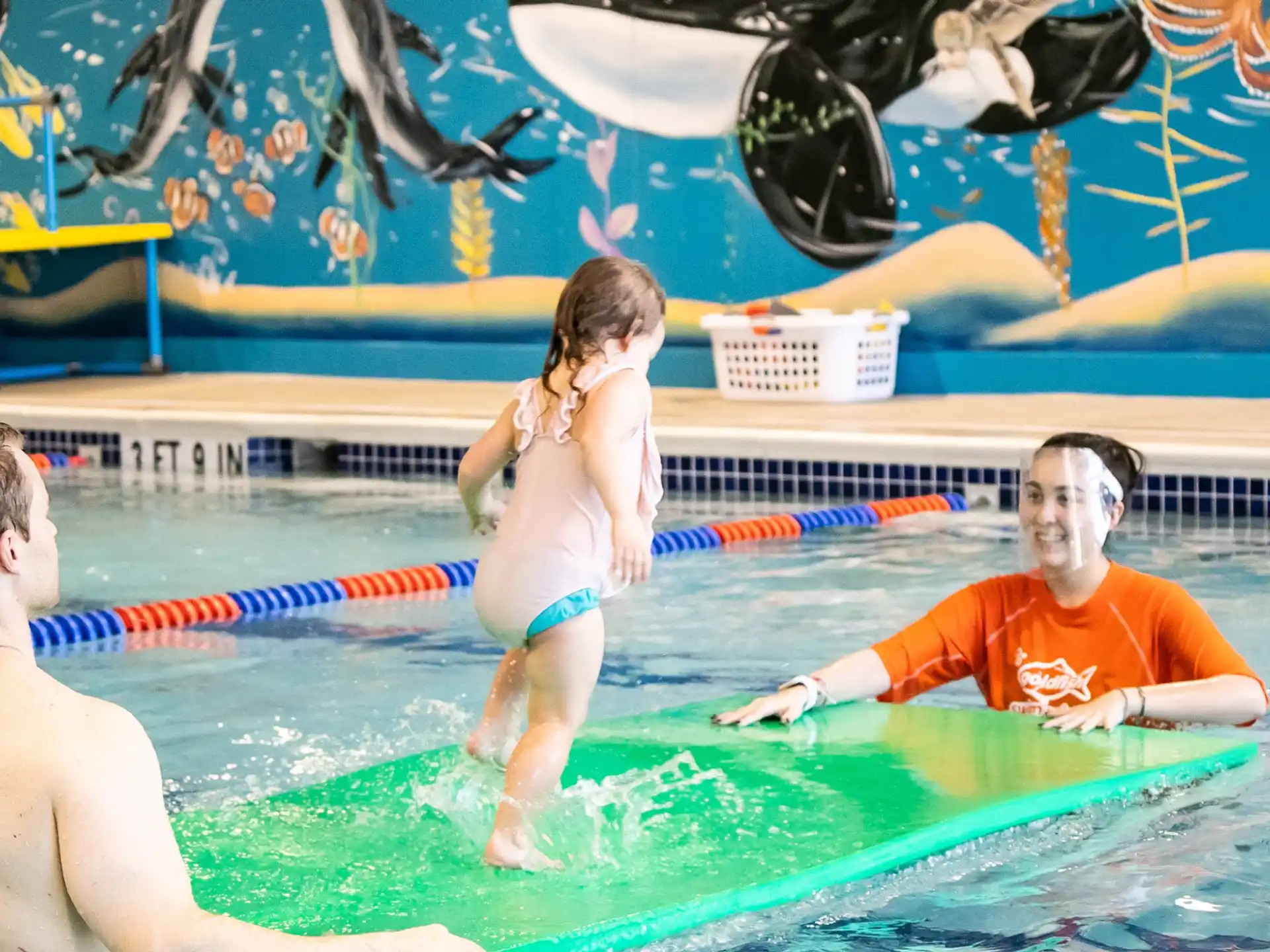 a person in a swimsuit in a pool
