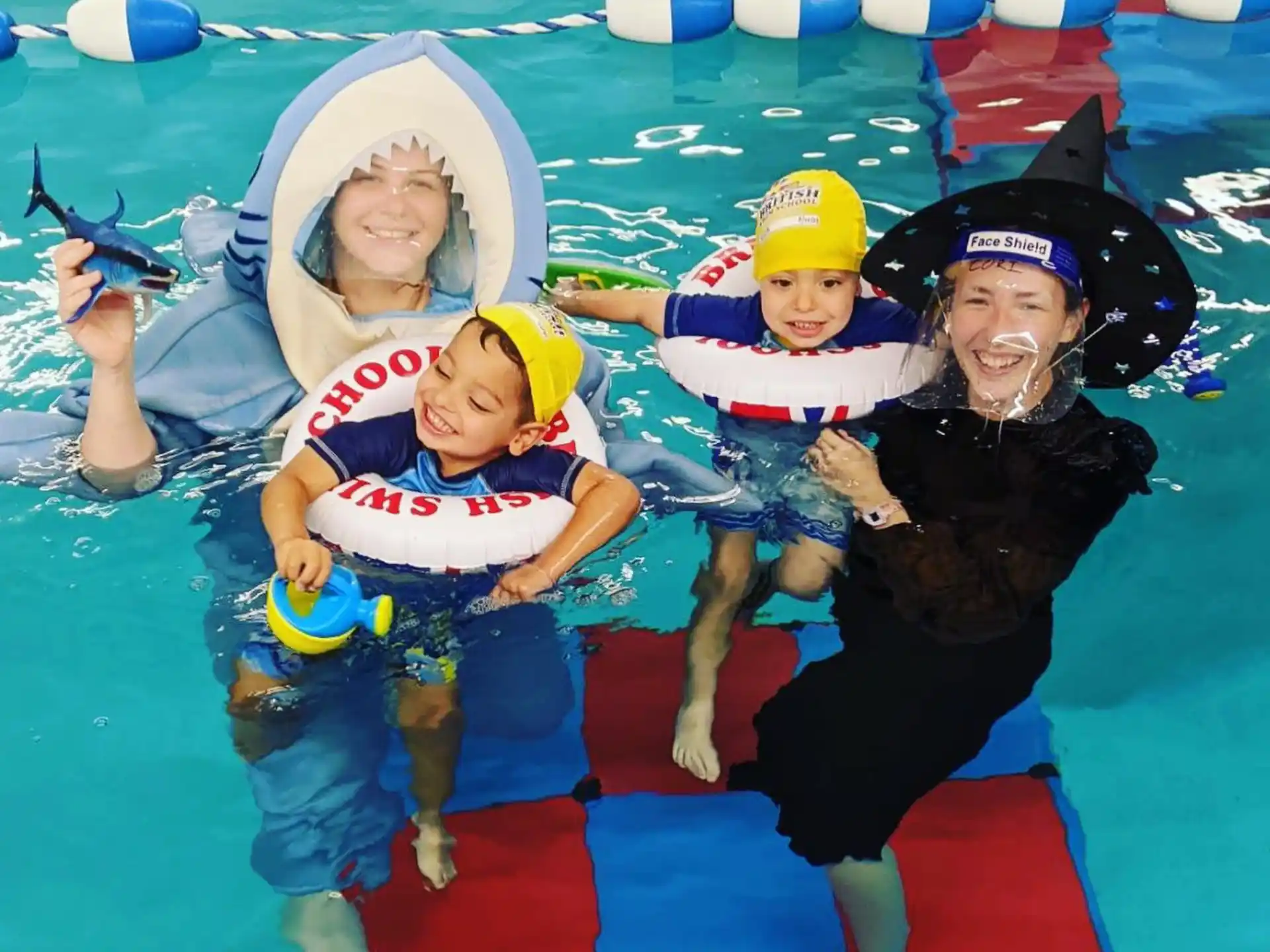 a group of people in a pool