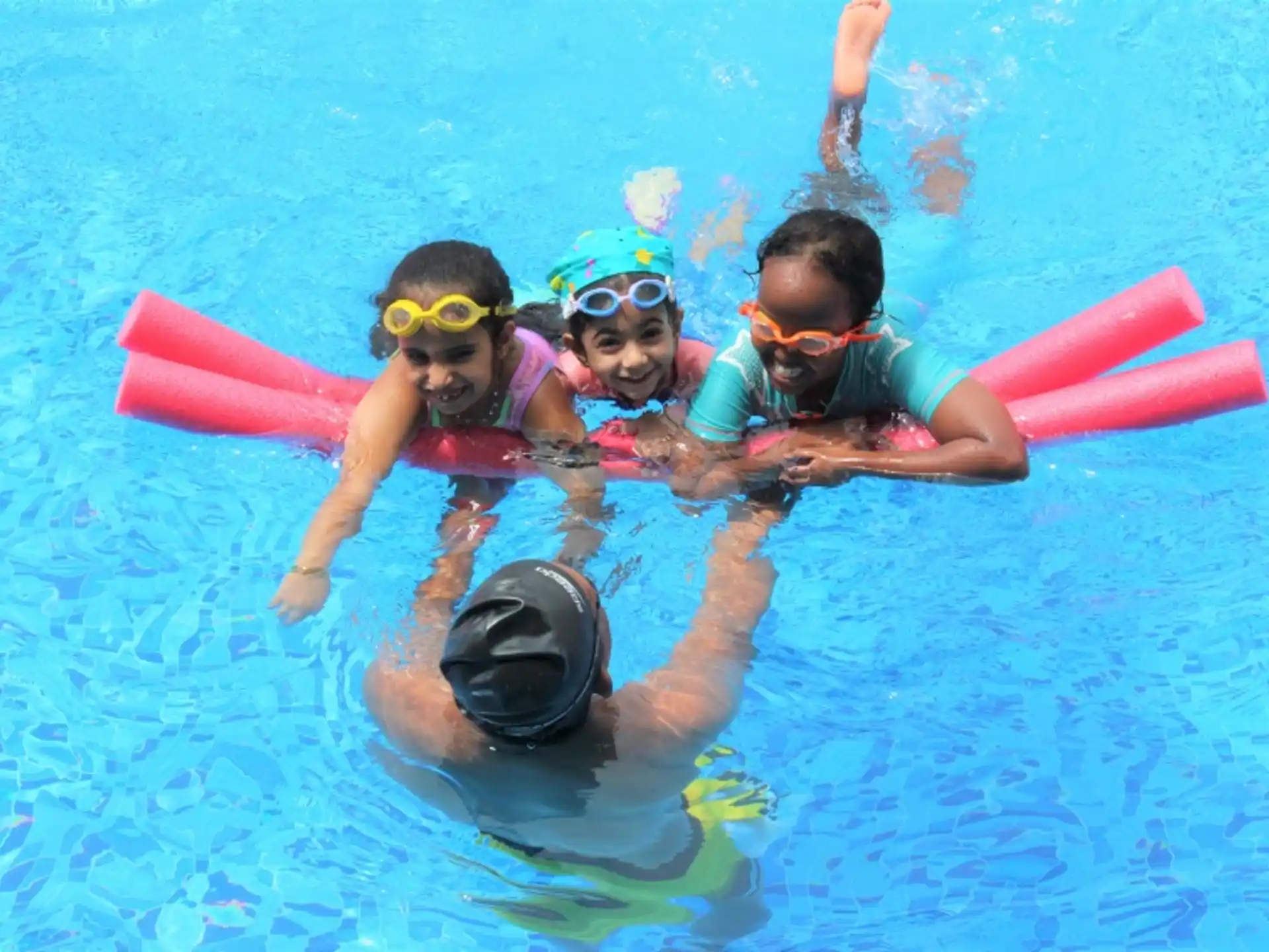 a group of people in a pool