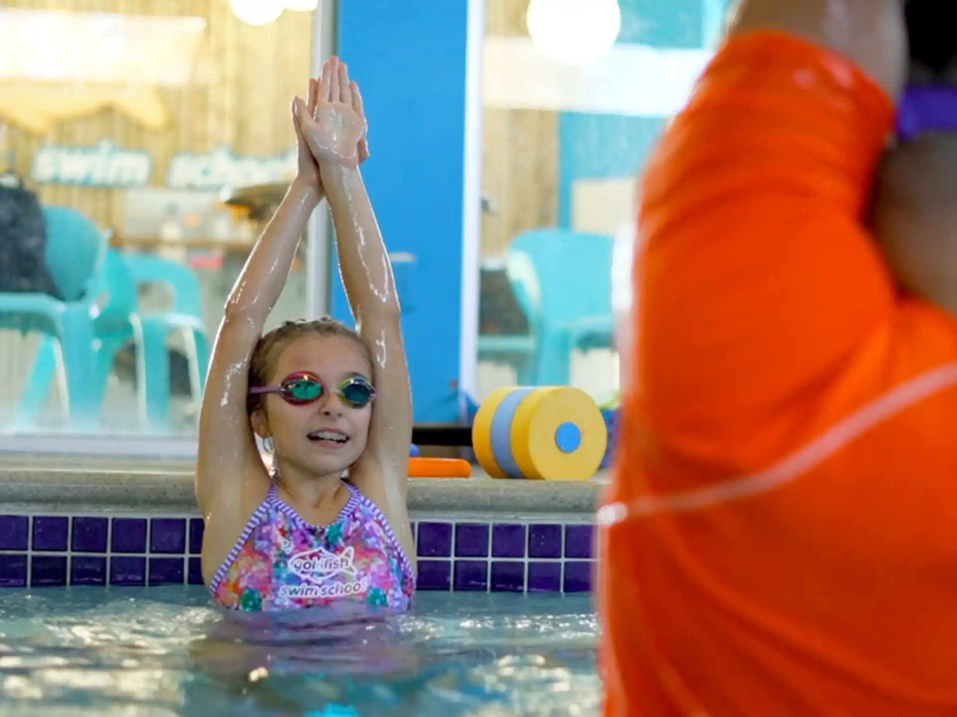 a girl in a pool