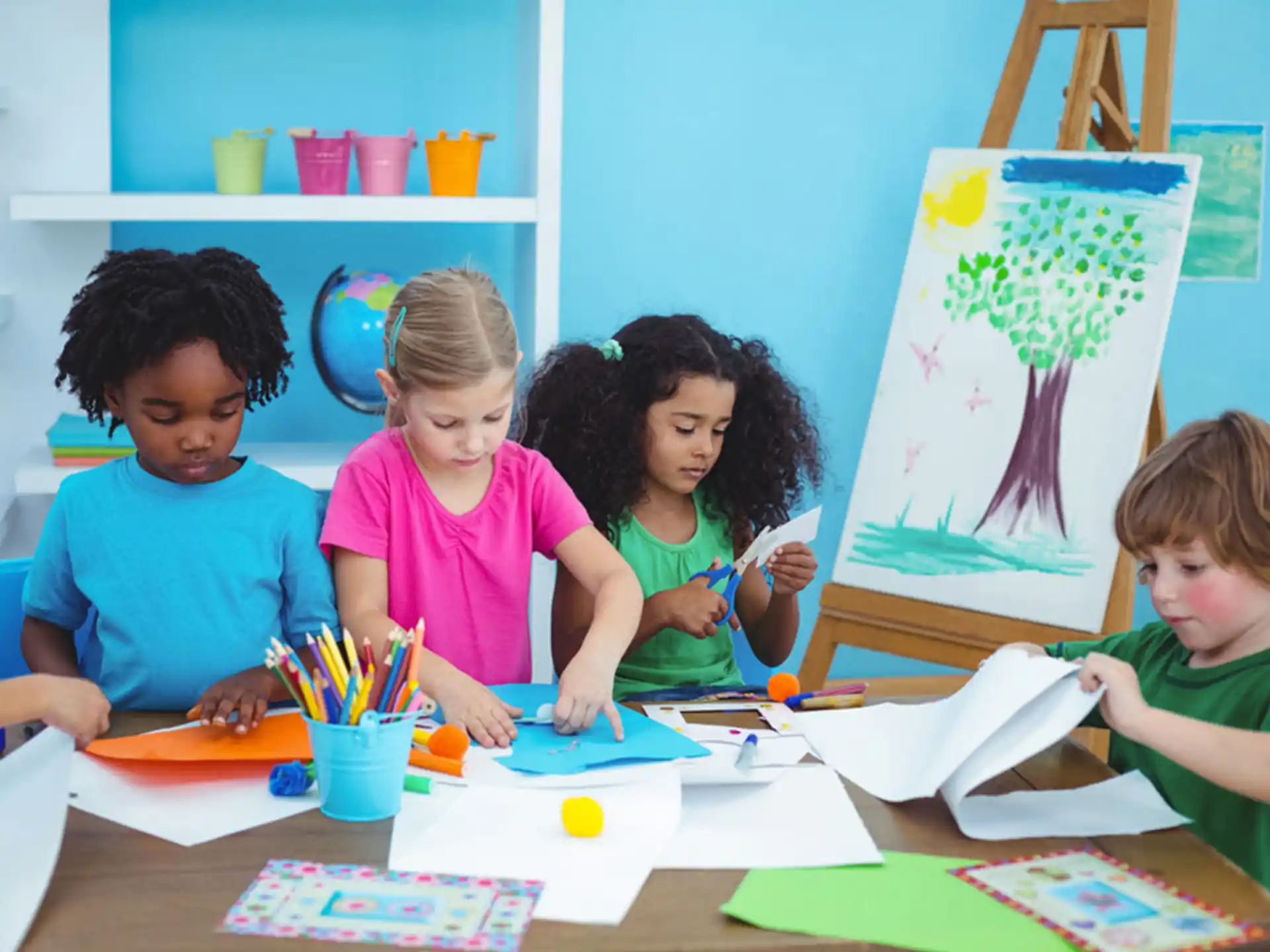 a group of children sitting at a table